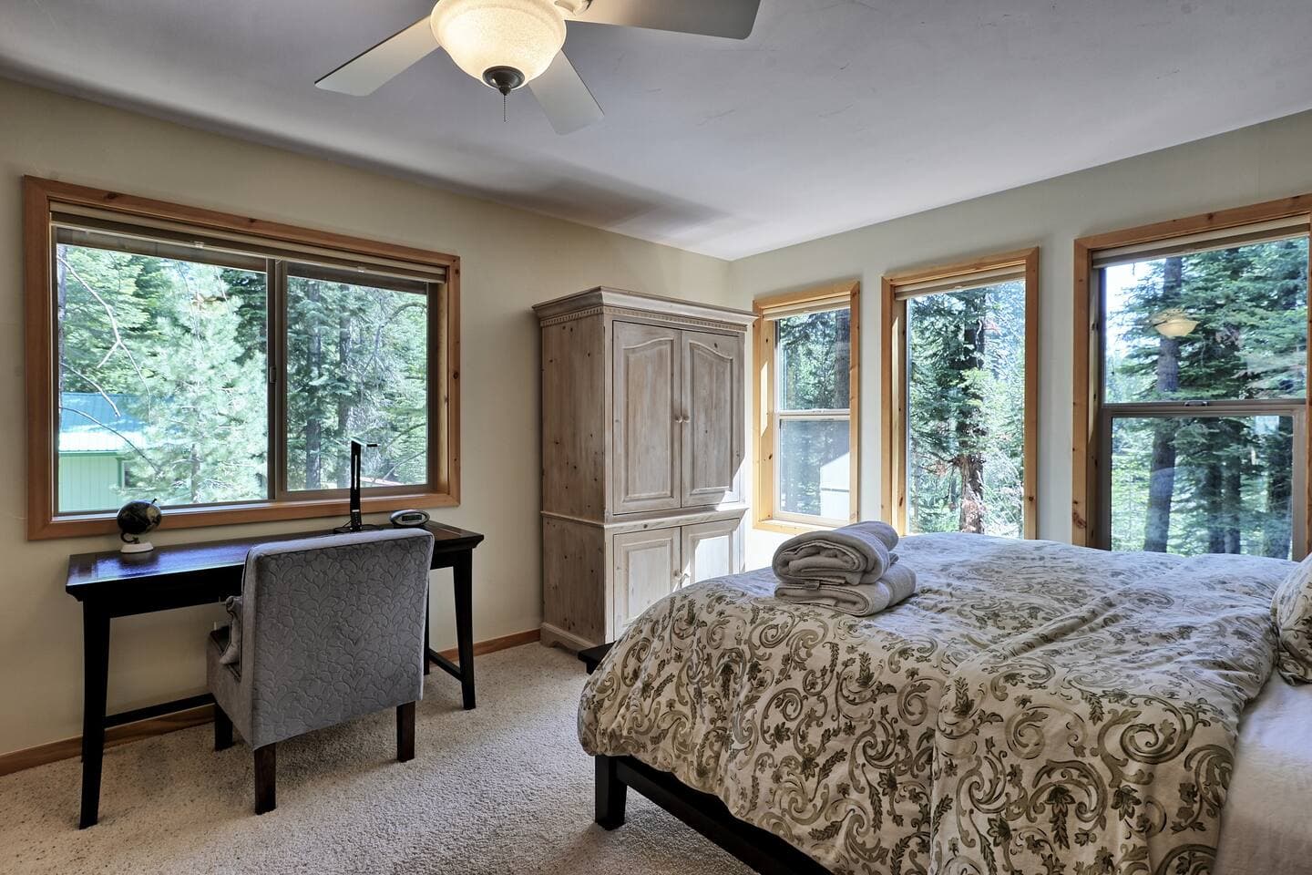 The primary bedroom has a comfortable king size bed for you to get a great night's rest.