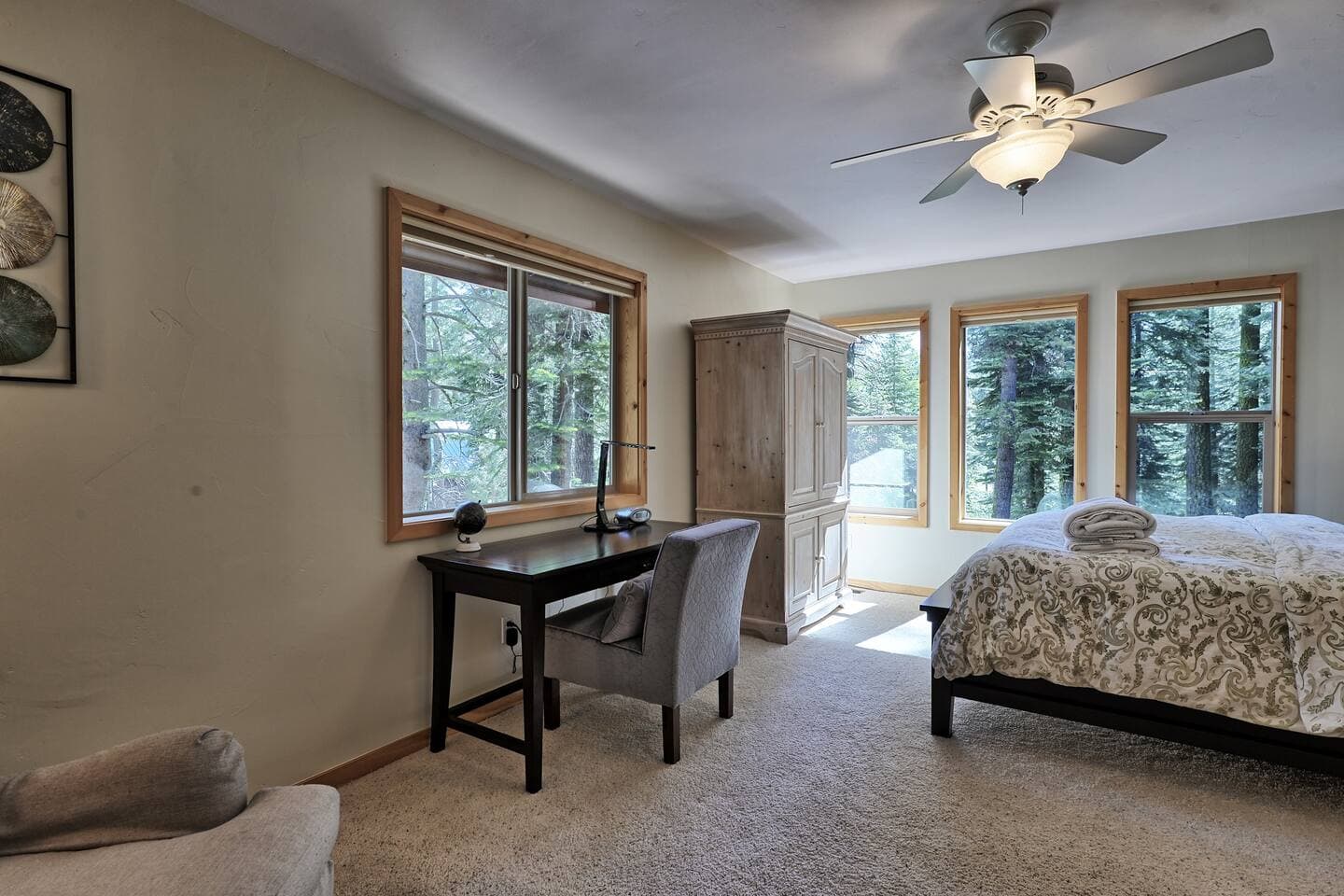 If you need to work or check your email while on vacation, the primary bedroom offers a dedicated work space with an incredible view.