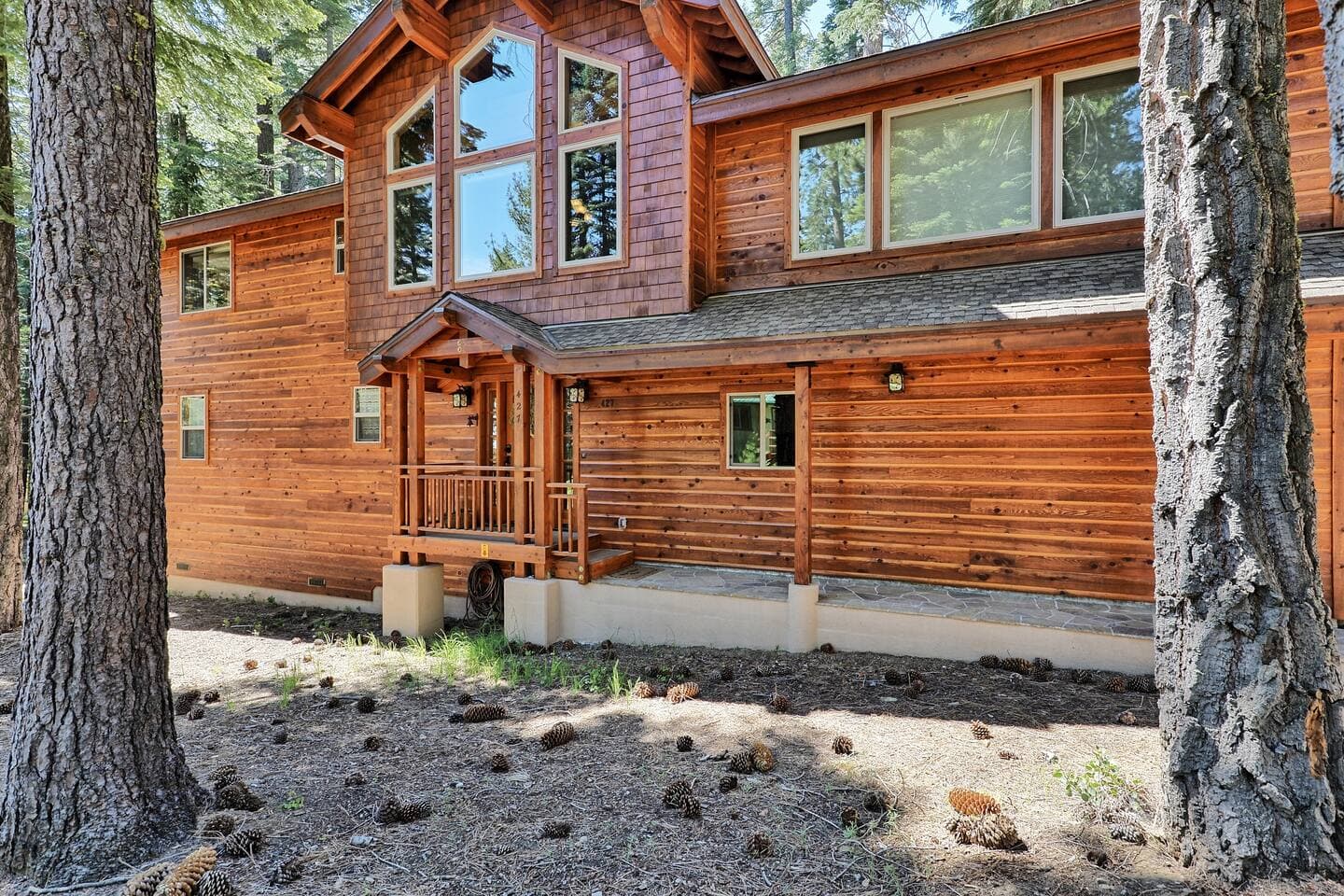 Whether standing on the front porch or the back, you'll be surrounded by beautiful pines.