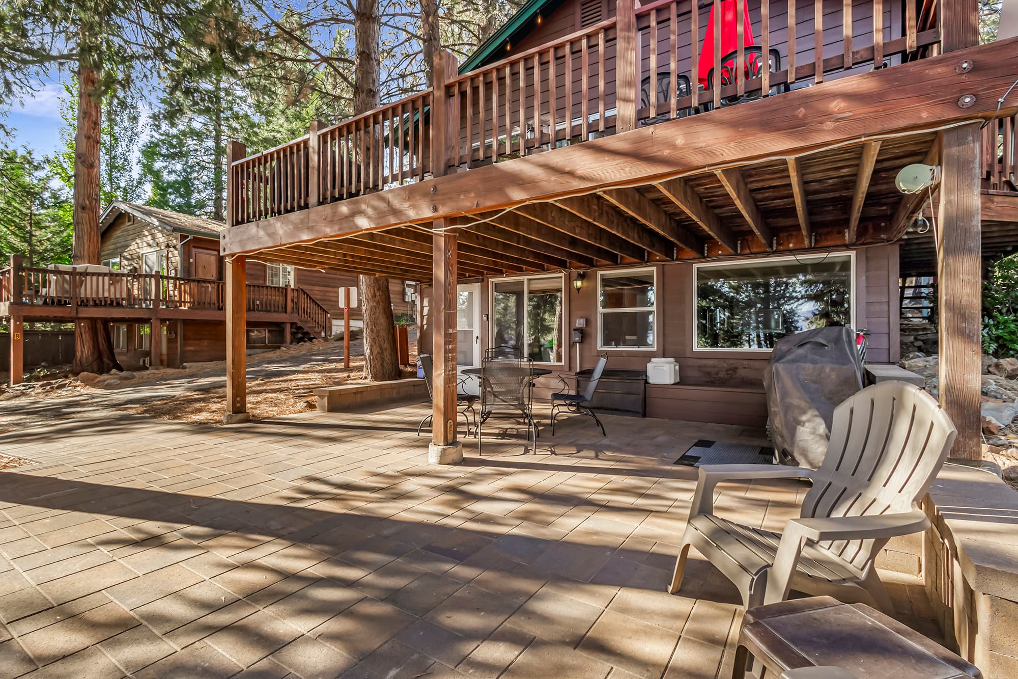 Cabin 6 with outside seating and BBQ.