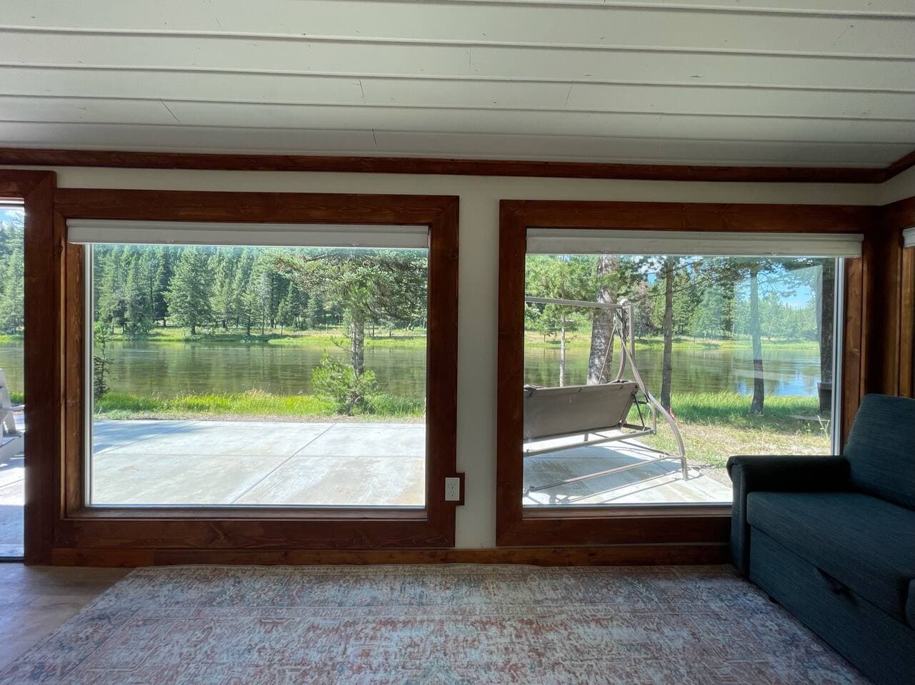 The large windows bring the outdoors in.