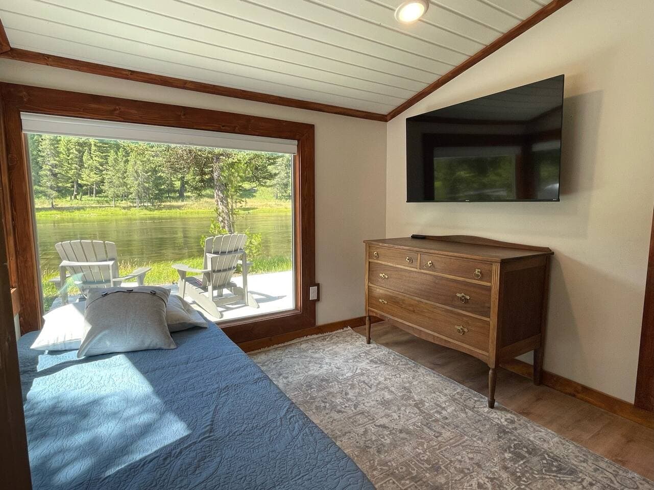 There is a twin bed and a TV in the room off the primary bedroom.
