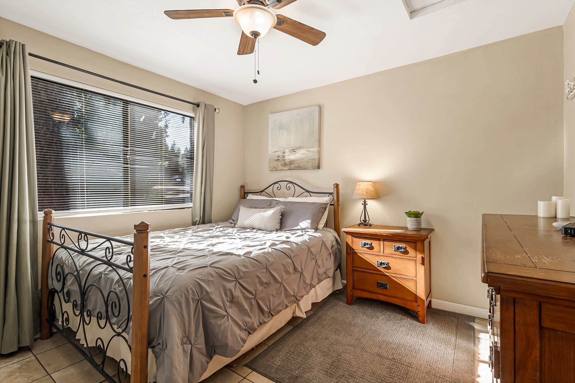 Bedroom 1 has a queen size bed.