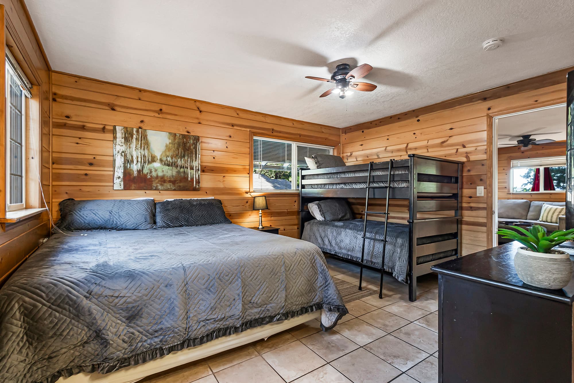 Bedroom 2 has a king size bed along with twin bunk beds.