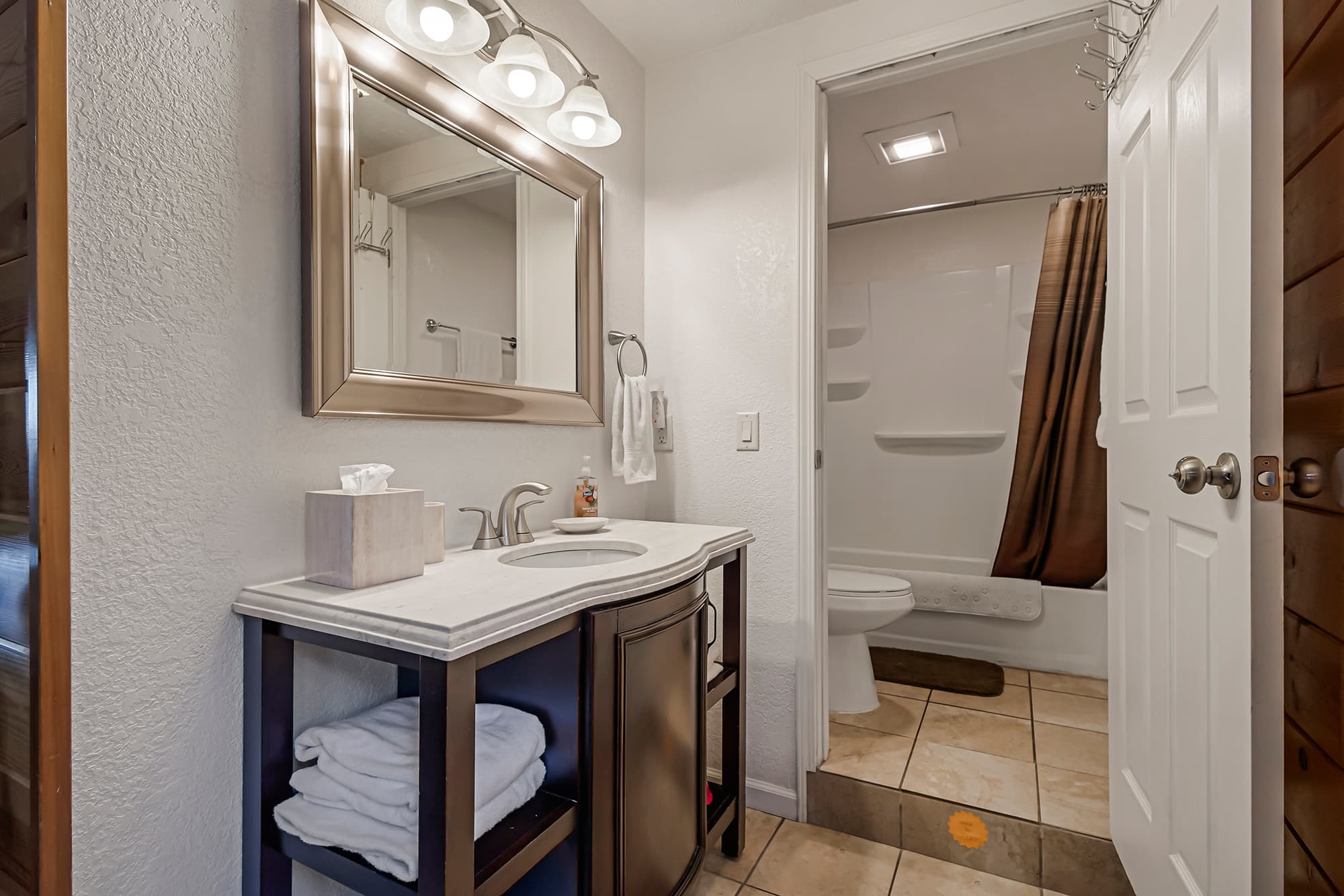 Bathroom 2 with shower/tub combo.