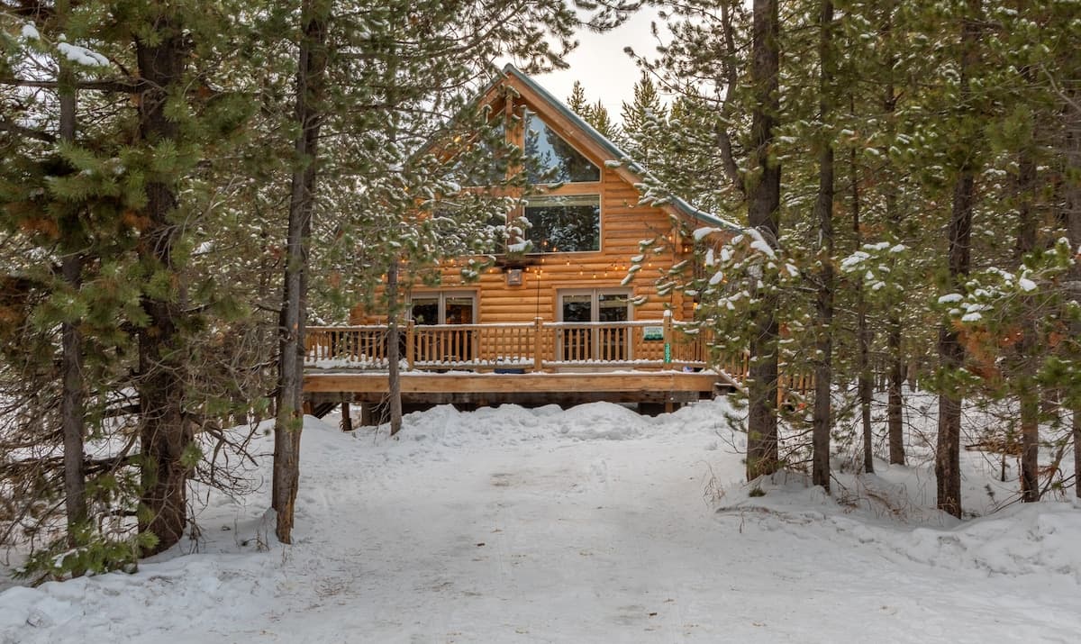 Our beautiful cabin nestled in the tall pines.
