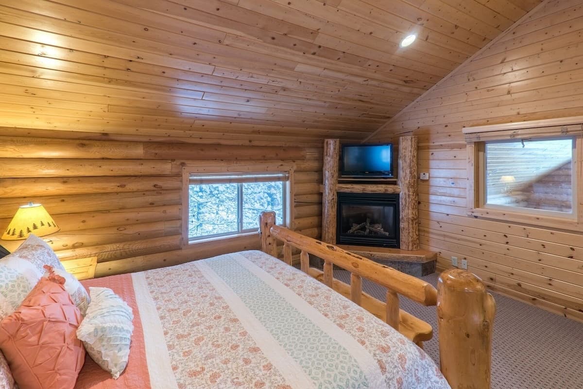 Watch TV or relax in front of a crackling fireplace in the primary bedroom.