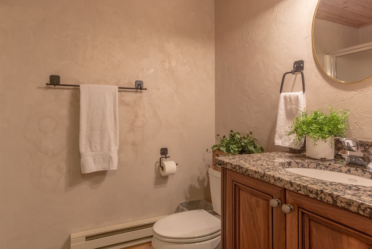 Each bathroom has upgraded granite and homey touches throughout.
