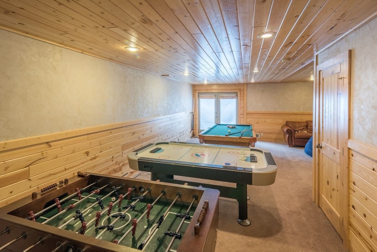 With a foosball table, air hockey, and billiards, the spacious game room will provide hours of fun with family or friends.