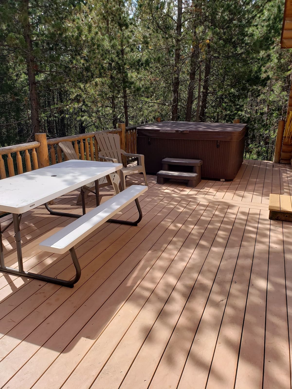 Soak in a private jetted hot tub surrounded by scenic views.  Or enjoy a picnic under the shade trees.