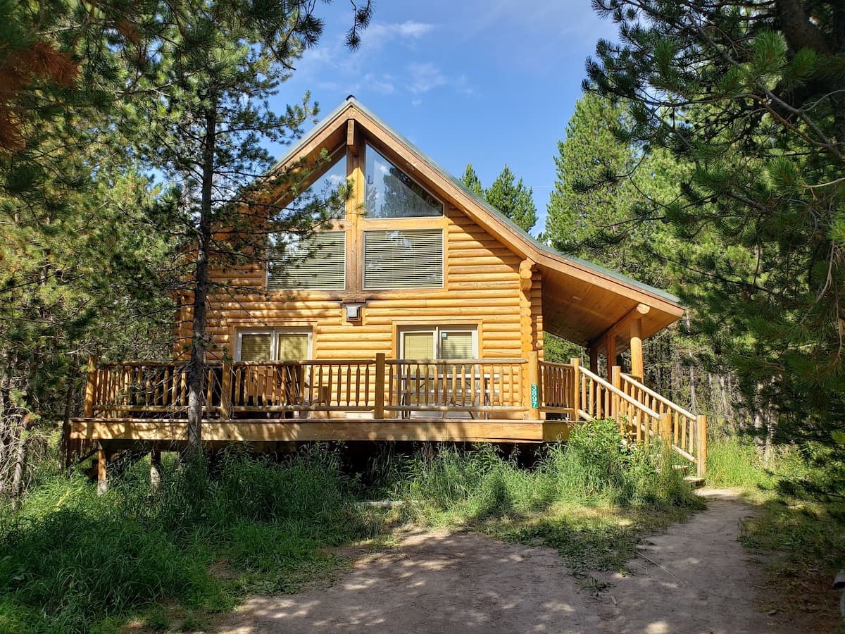 Surrounded by lush pine trees, our cabin is conveniently close to Henry Lake and Yellowstone National Park.