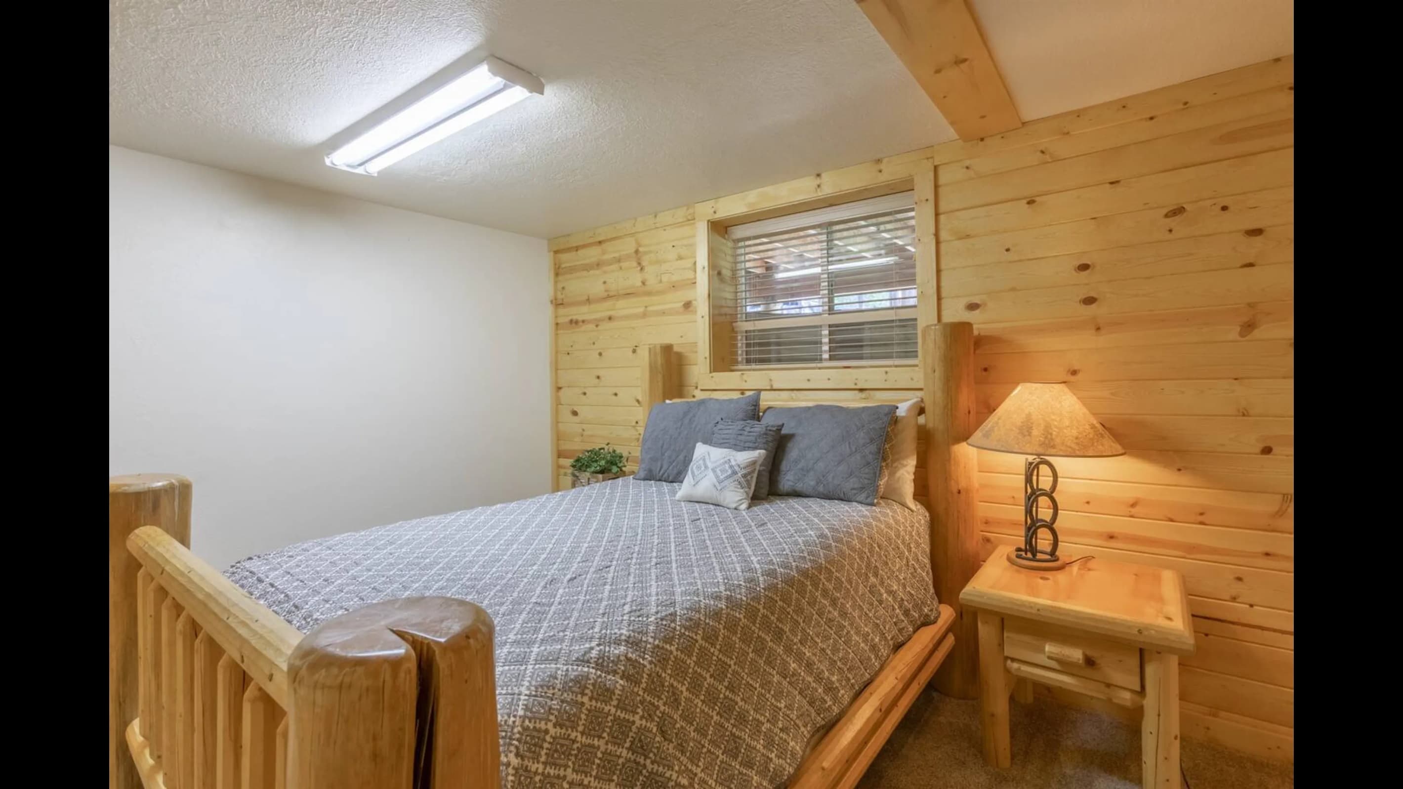 Rustic, sturdy furniture graces every corner of the room.