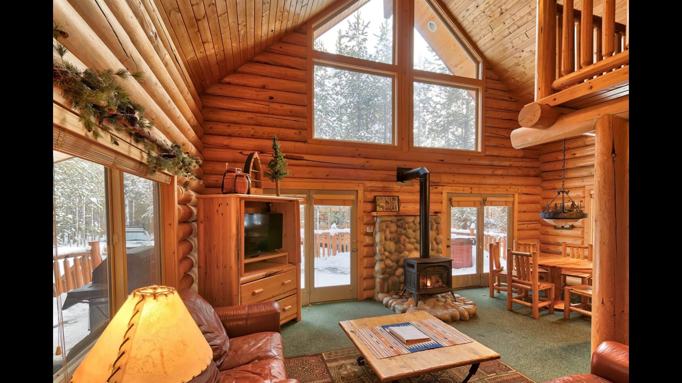 Enjoy the beauty indoors and out with abundant natural light flooding through wide windows, unveiling snowy vistas beyond.