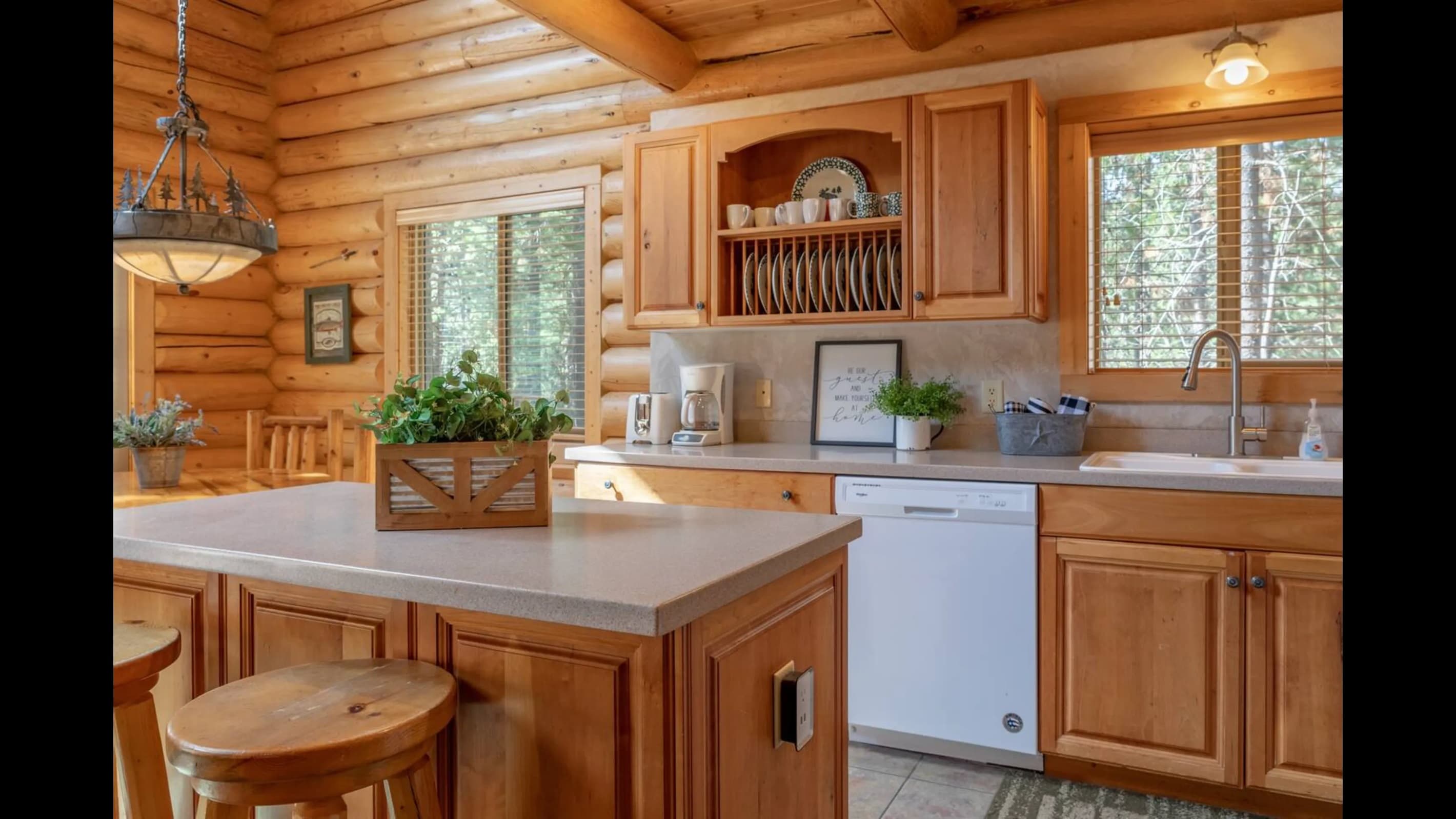 The countertops in a light hue provide plenty of space for meal preparation and various tasks.