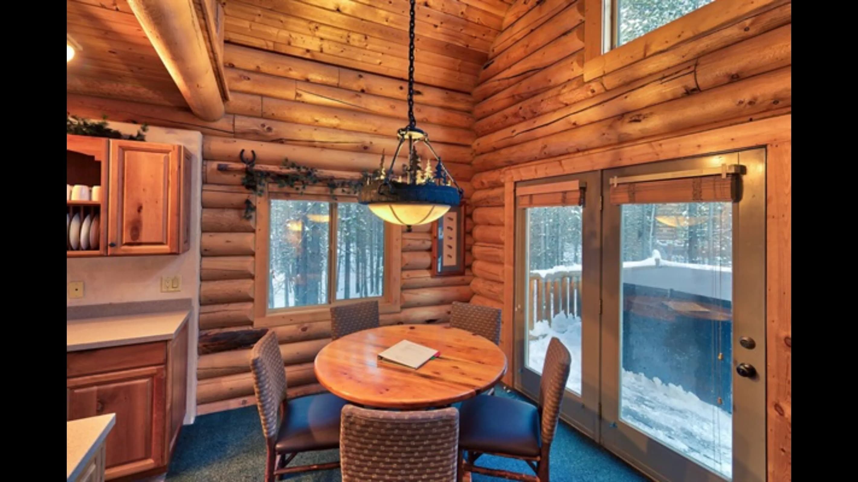 Dining for 5 with stunning views of the surrounding landscape.