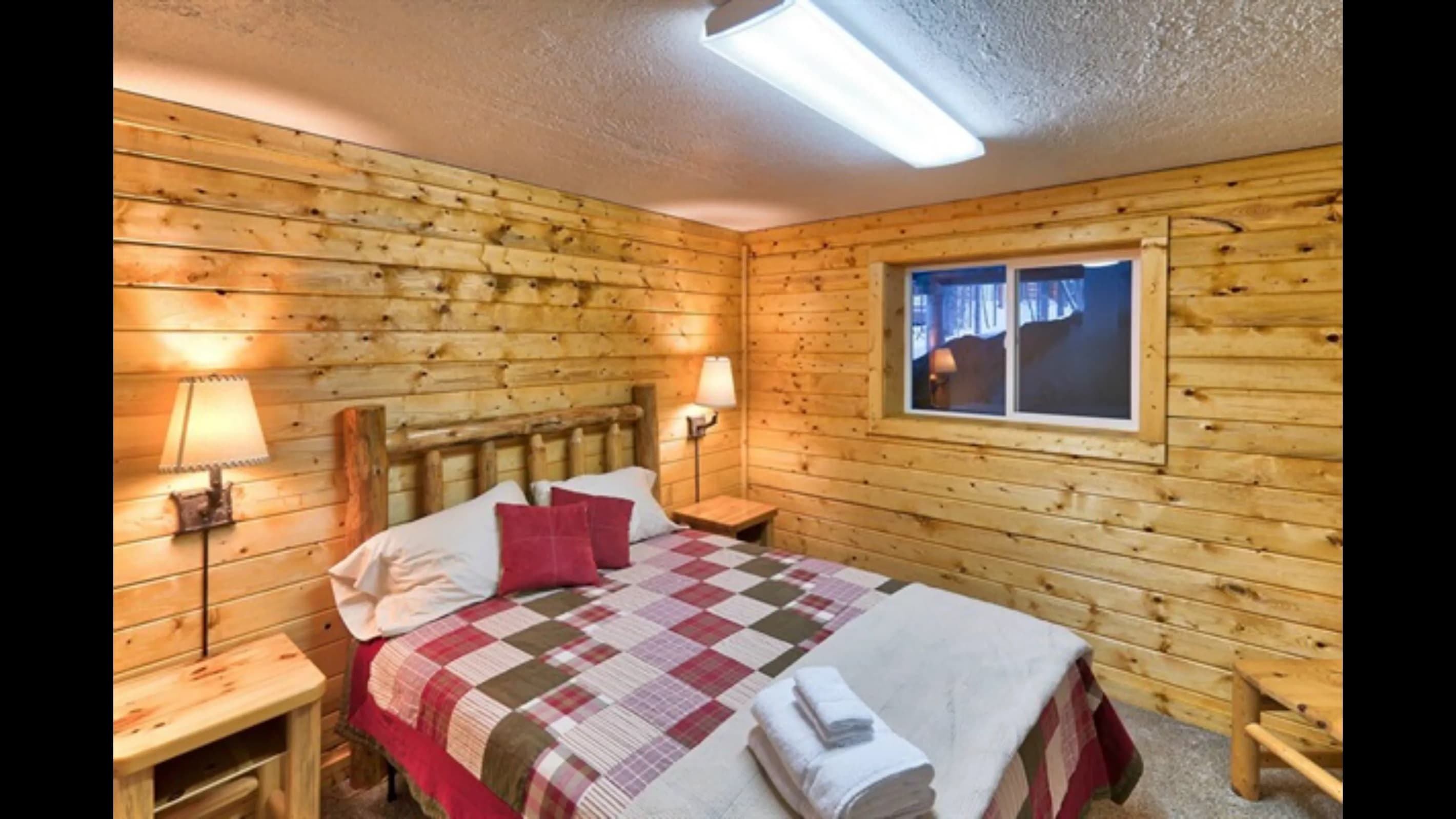 Bedroom 5 features a comfortable queen bed.