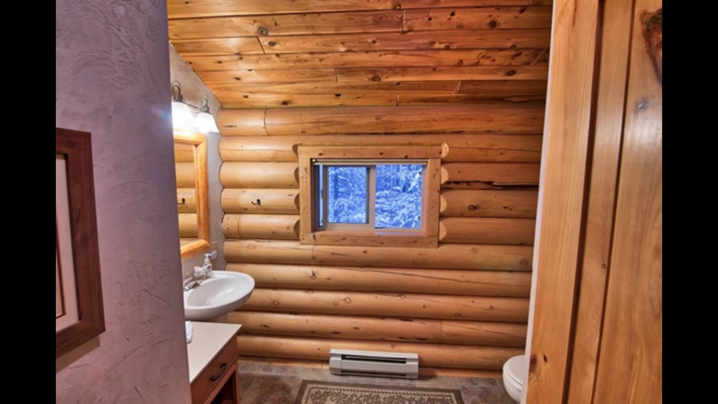 There are 2 bathrooms at Island Park Cabin 15.