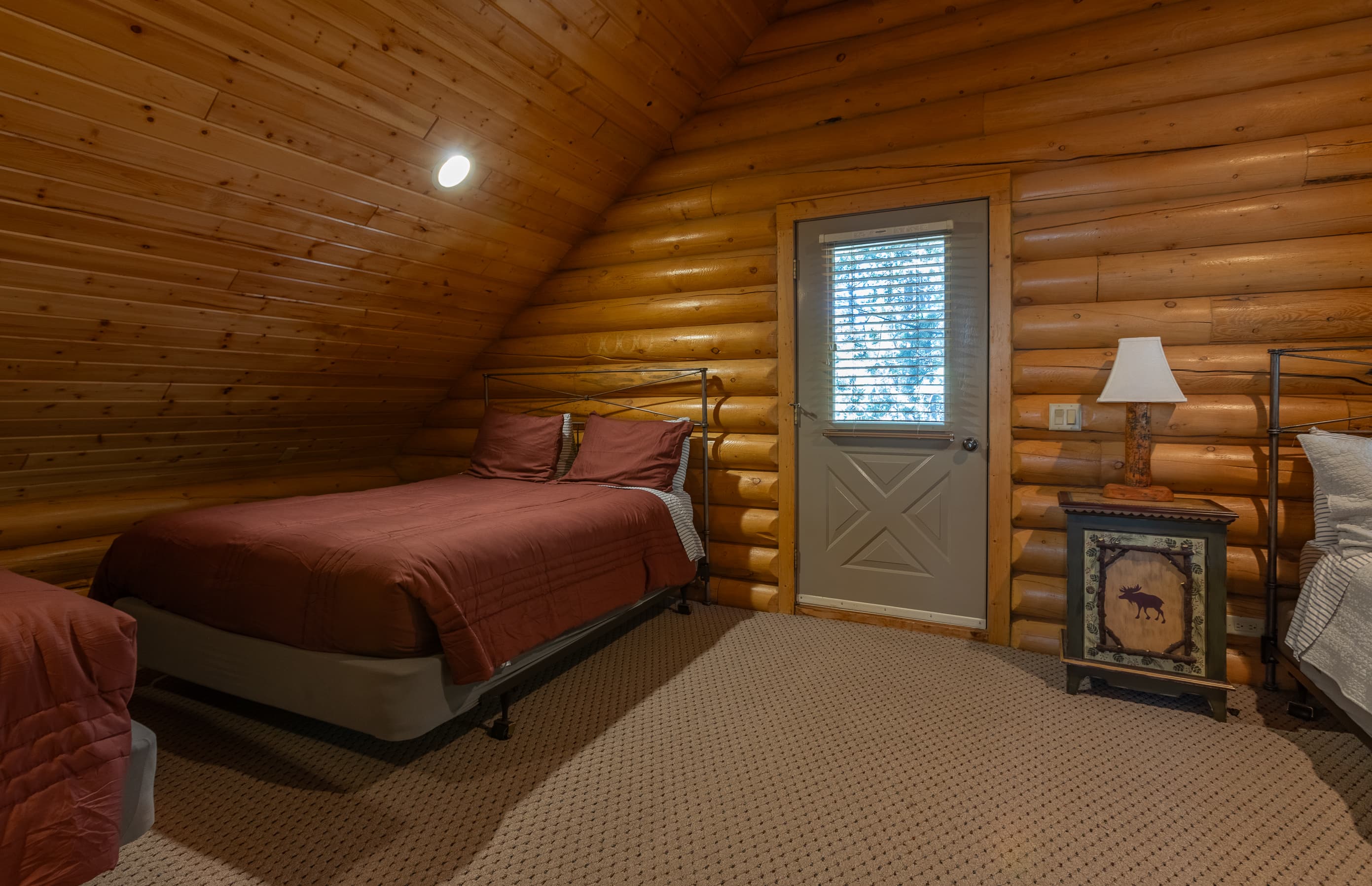 Spread out in style with three plush queen beds in our Bedroom 1.