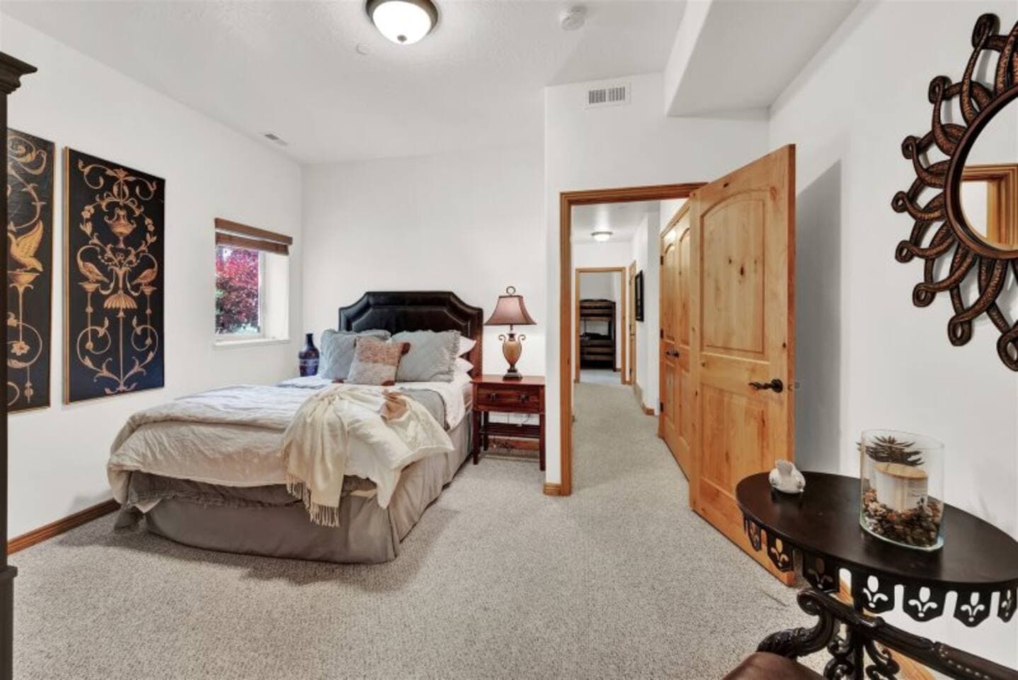 Downstairs bedroom with private bathroom.