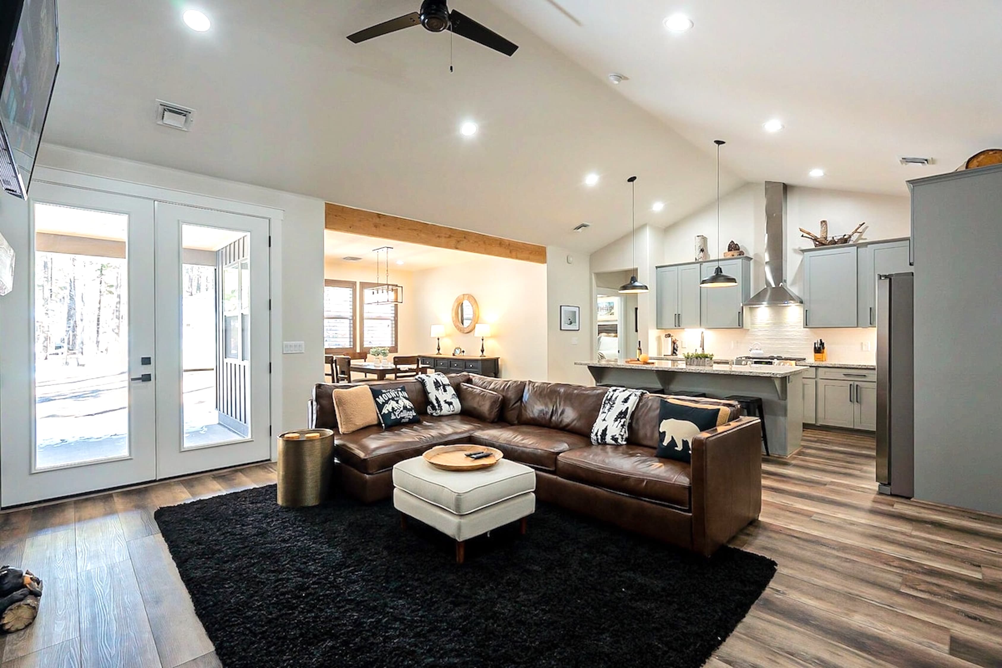 Step into a spacious open floor plan, where there’s plenty of seating for everyone to relax, connect, and make lasting memories.