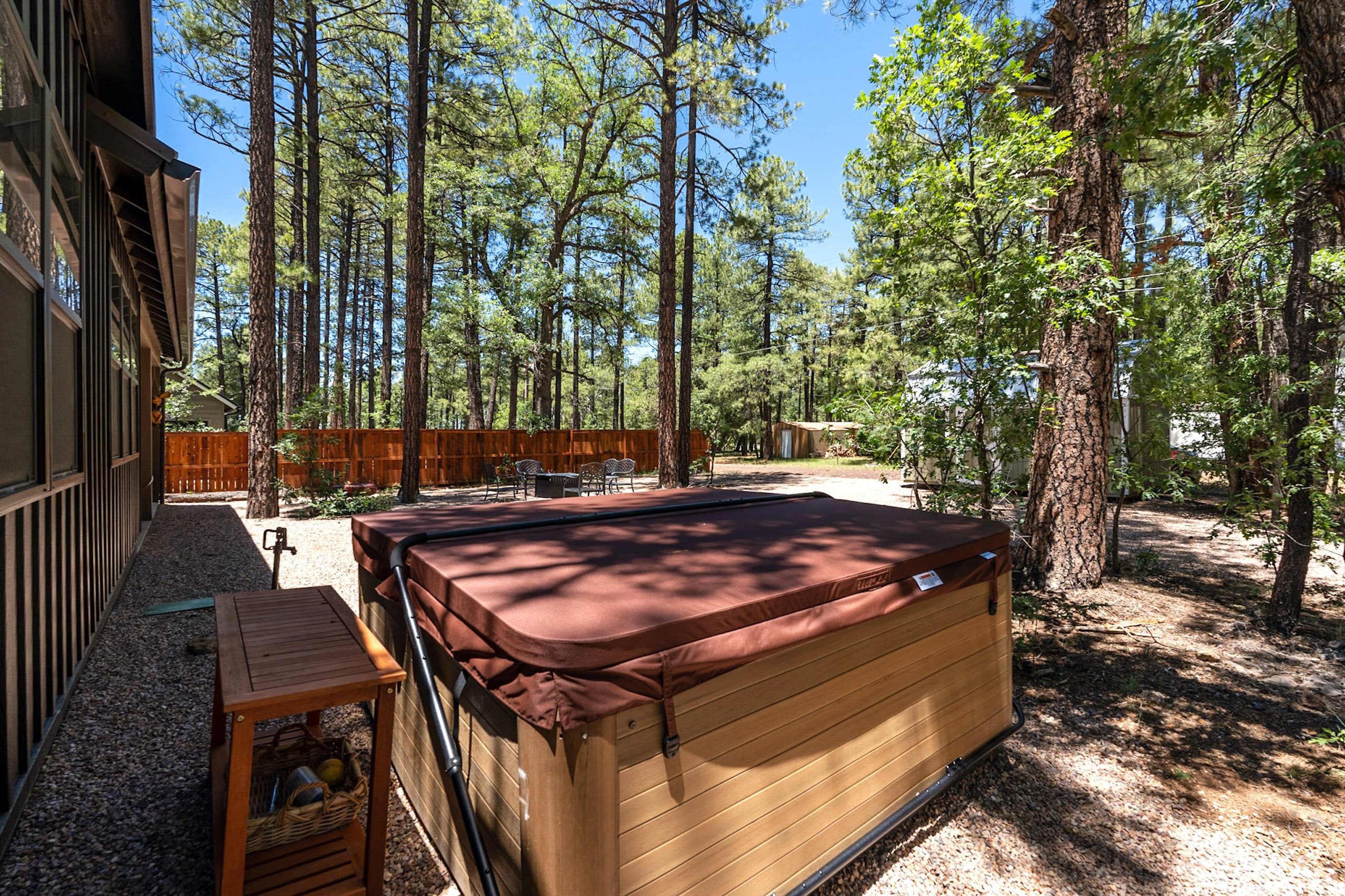 Unwind in the soothing hot tub surrounded by whispering pines — the perfect way to relax after a day of mountain adventures.