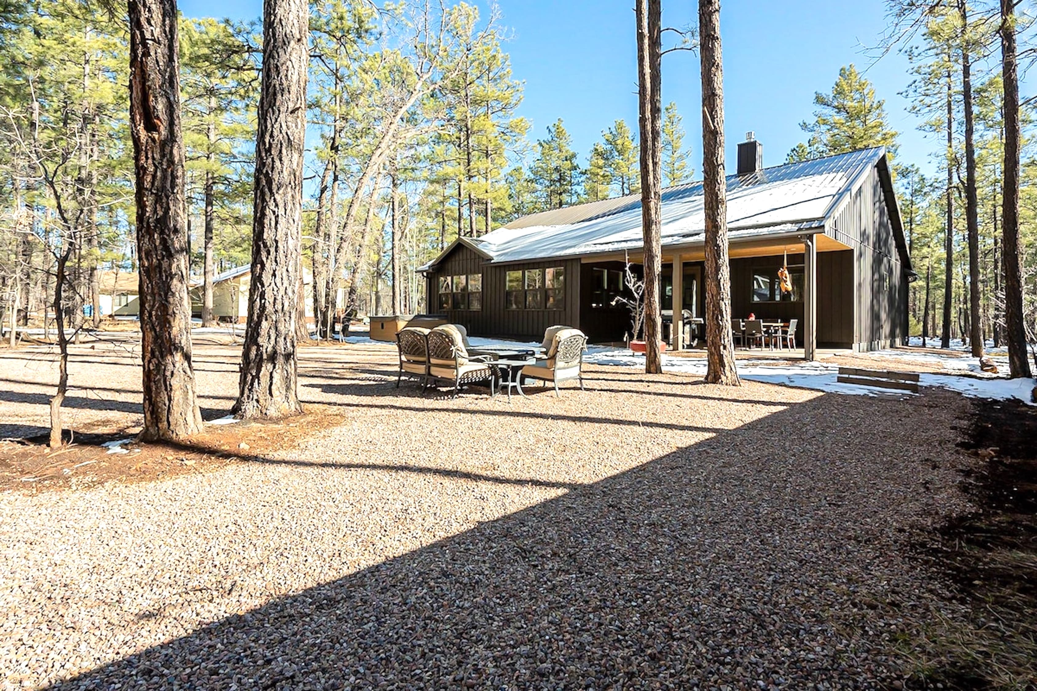 Breathe in the pine-scented air as you sip your morning coffee by the firepit, surrounded by towering trees and the soft rustle of nature. This is where time slows down, and peace finds you.