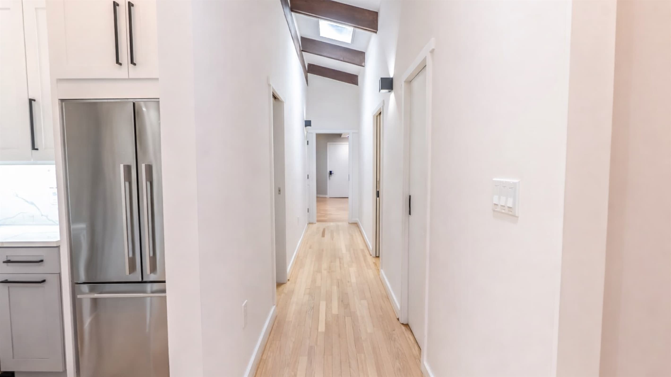 Single-Level Estate — Stylish Hallway, Private Wing Access, Zen Design Aesthetic