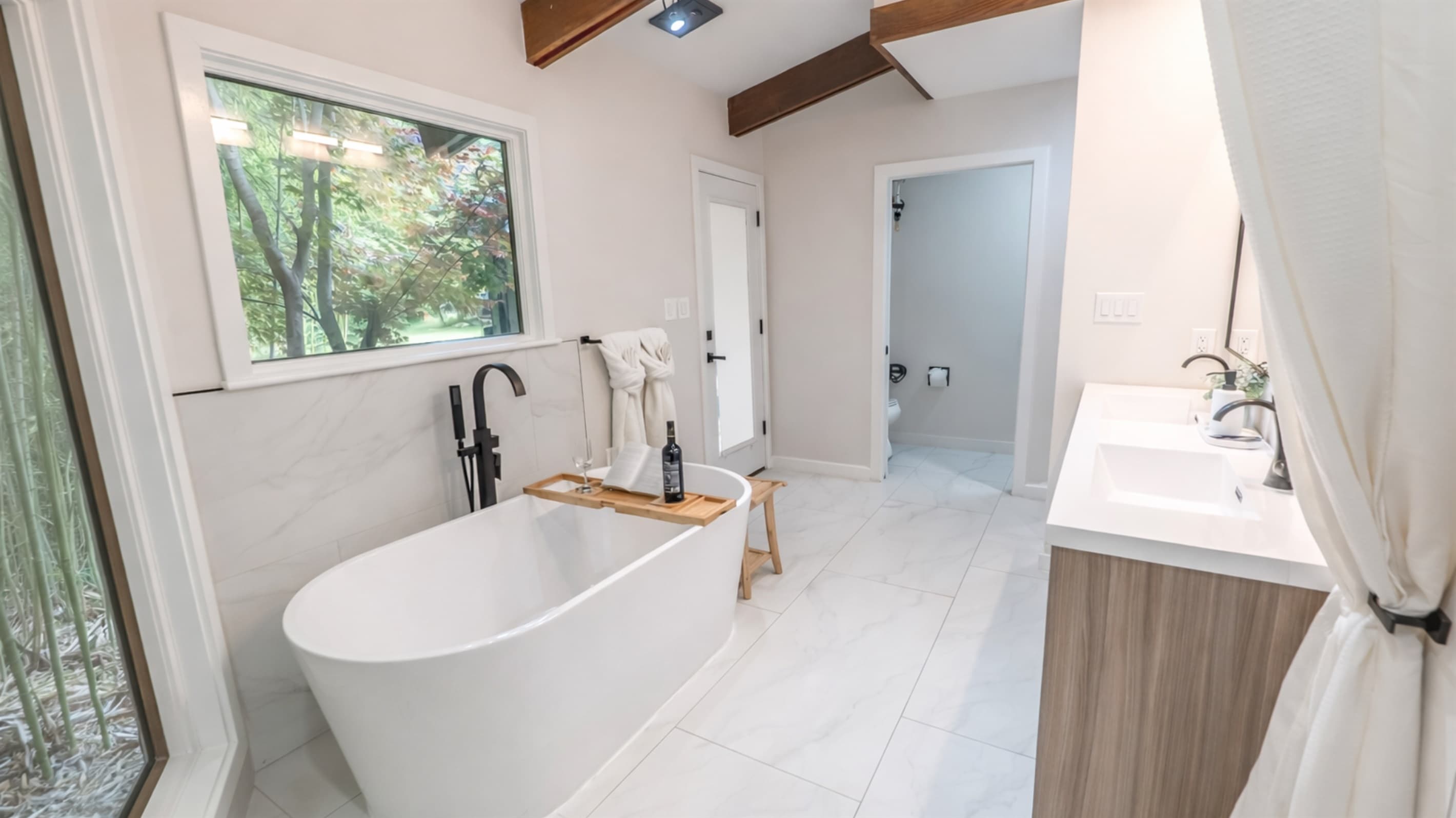En-Suite Bath — Freestanding Soaking Tub, Bamboo Garden Views, Zen Aesthetic