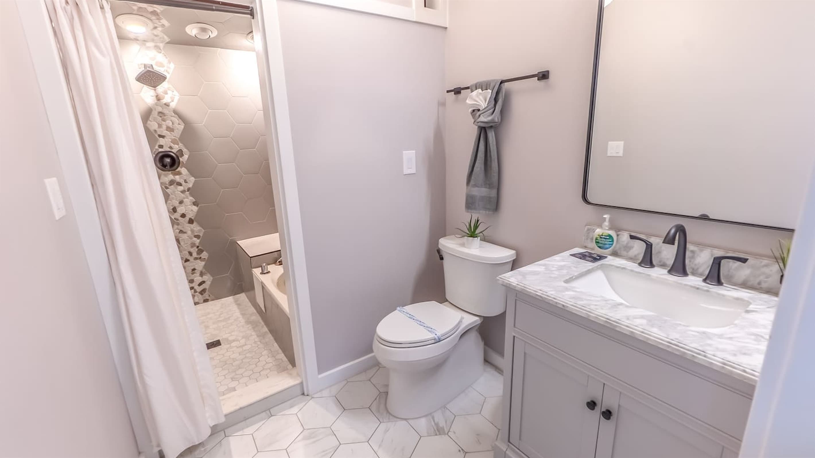 En-Suite Bath — Walk-In Shower, Clean Contemporary Design, Quality Finishes