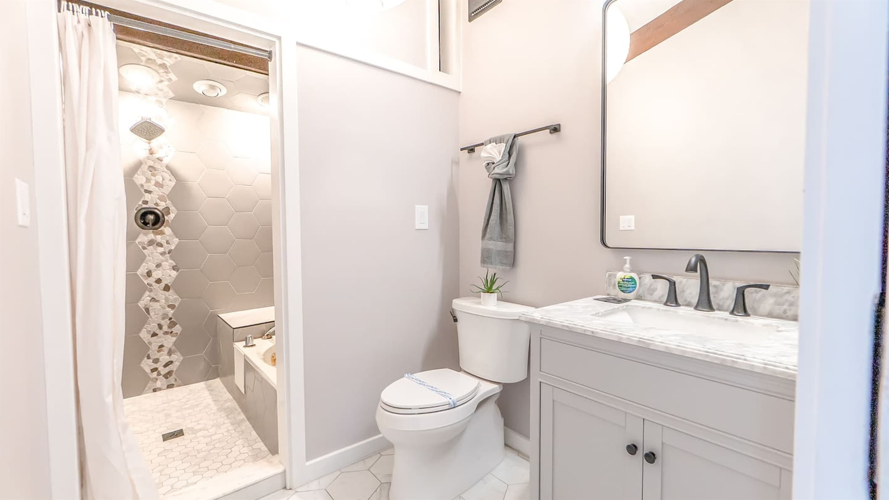 En-Suite Bath — Modern Fixtures, Premium Tile, Private to Each Bedroom
