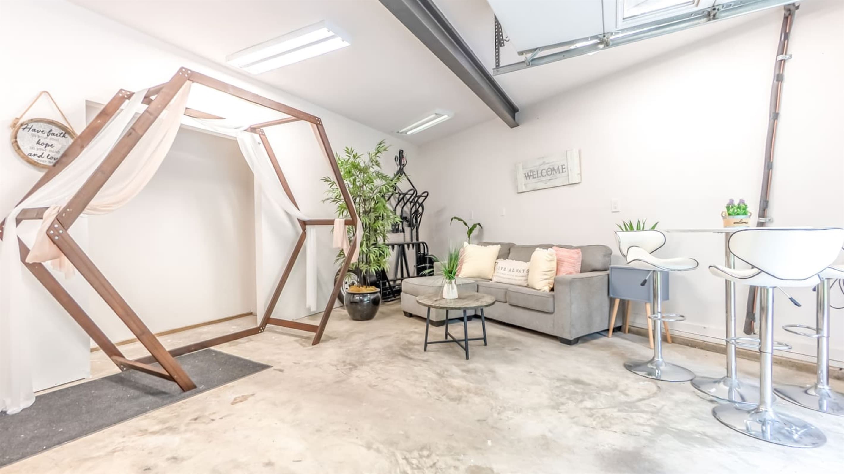Zen Workspace — Lounge Area, Geometric Art Wall, Natural Light, Quiet Setting