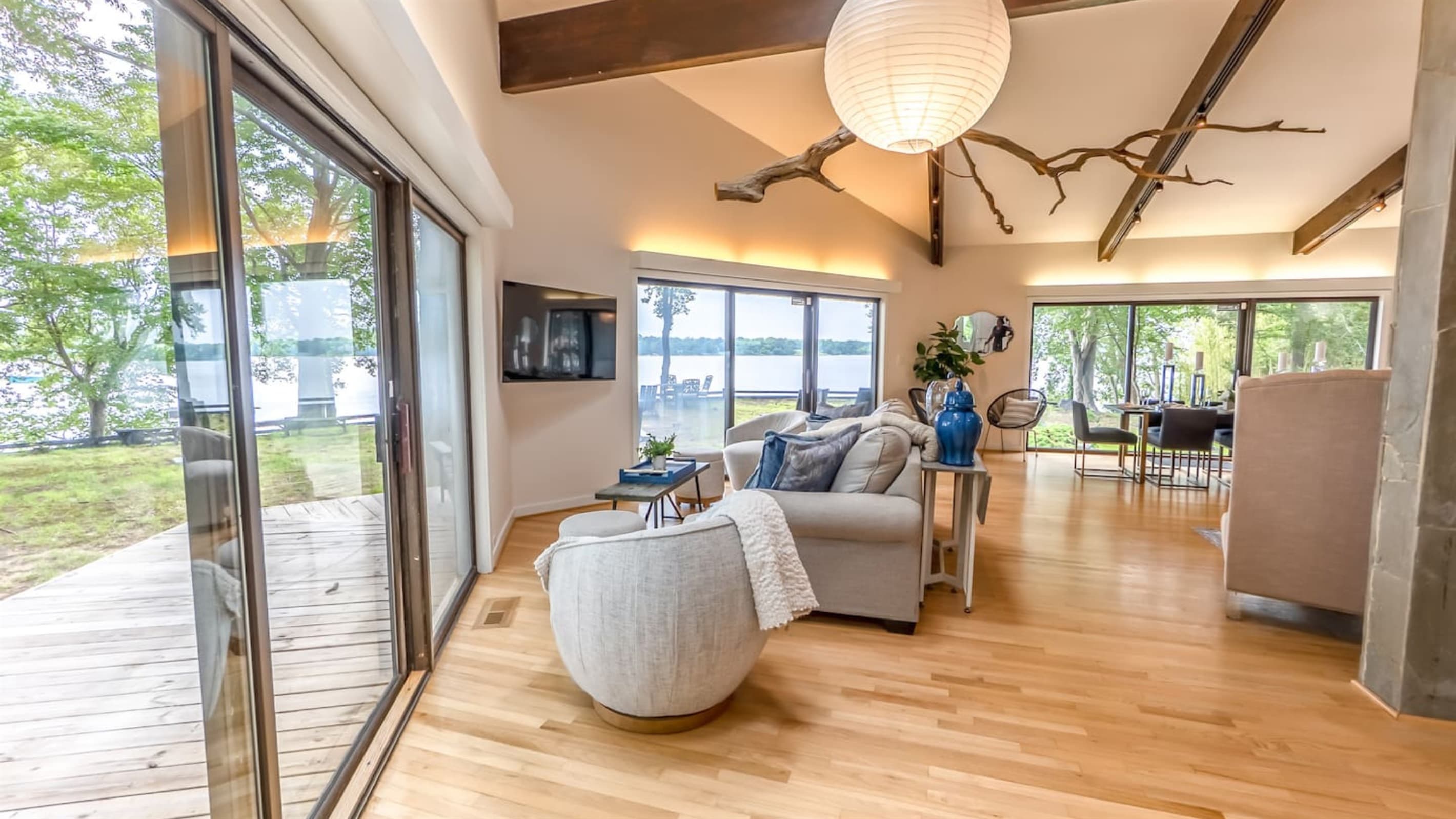 Gathering Space — Panoramic Bay Windows, Lush Garden Views, Curated Interior