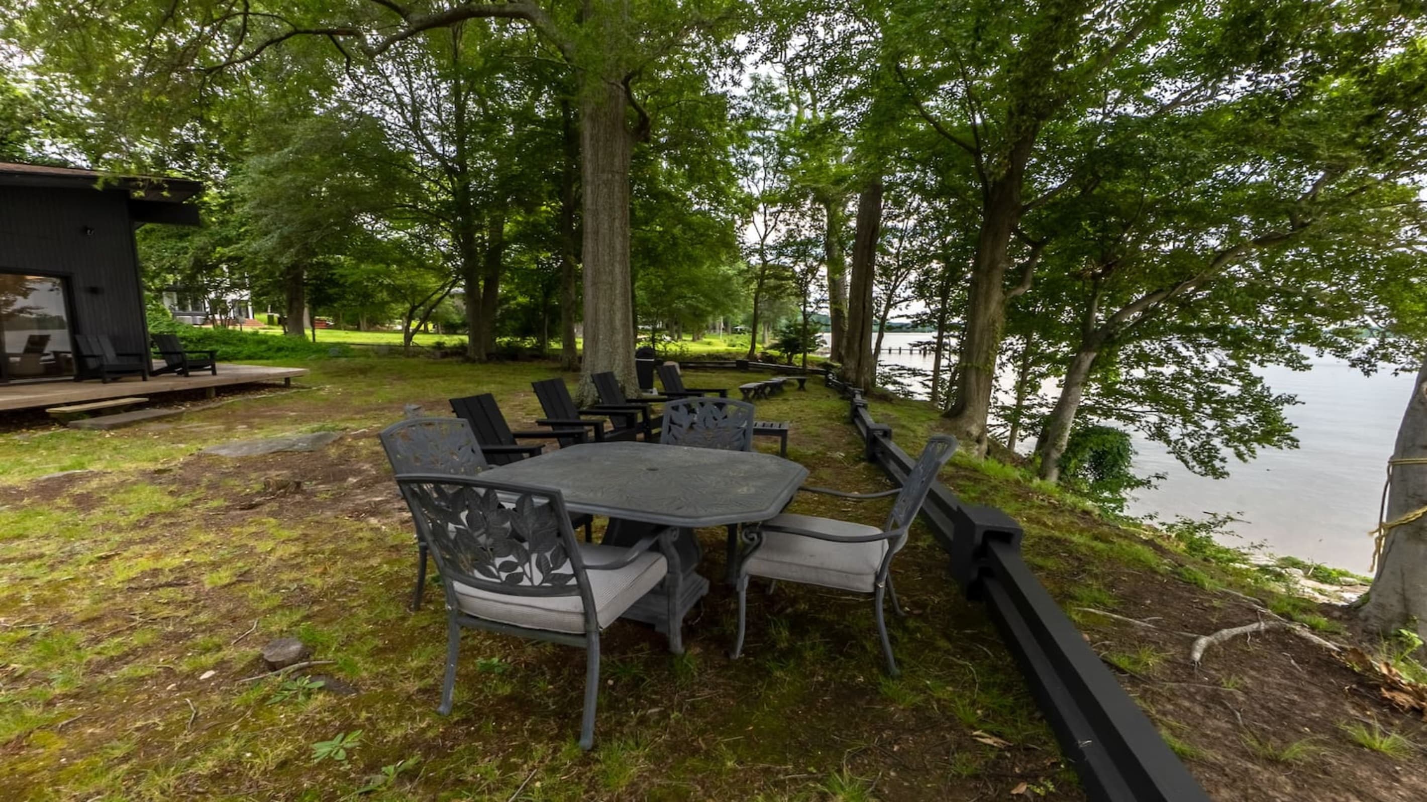 Waterfront Estate — Patio Seating, Outdoor Dining, Sunset-Facing Riverside Area