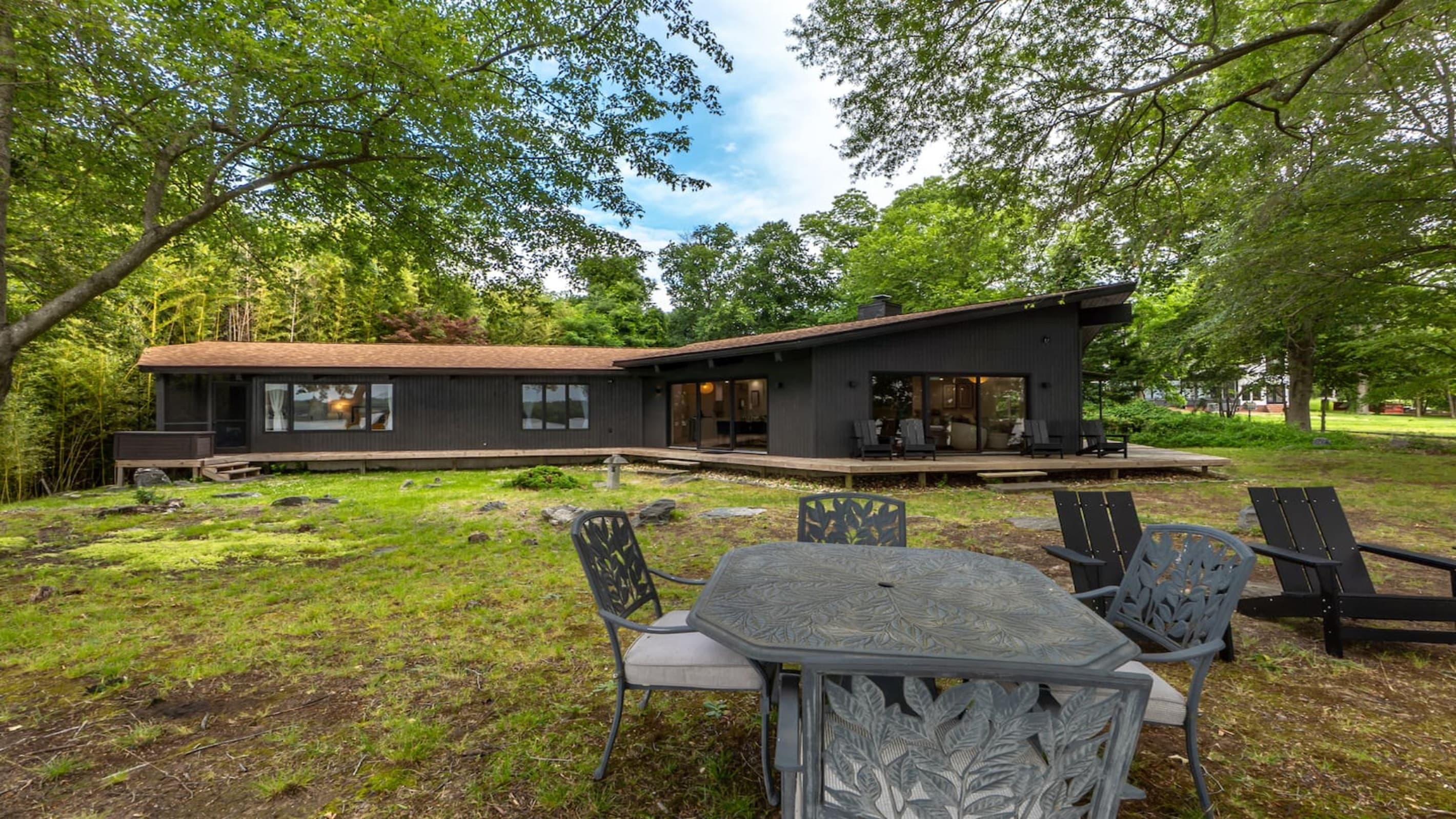 Waterfront Estate — Patio Seating, Outdoor Dining, Sunset-Facing Riverside Area