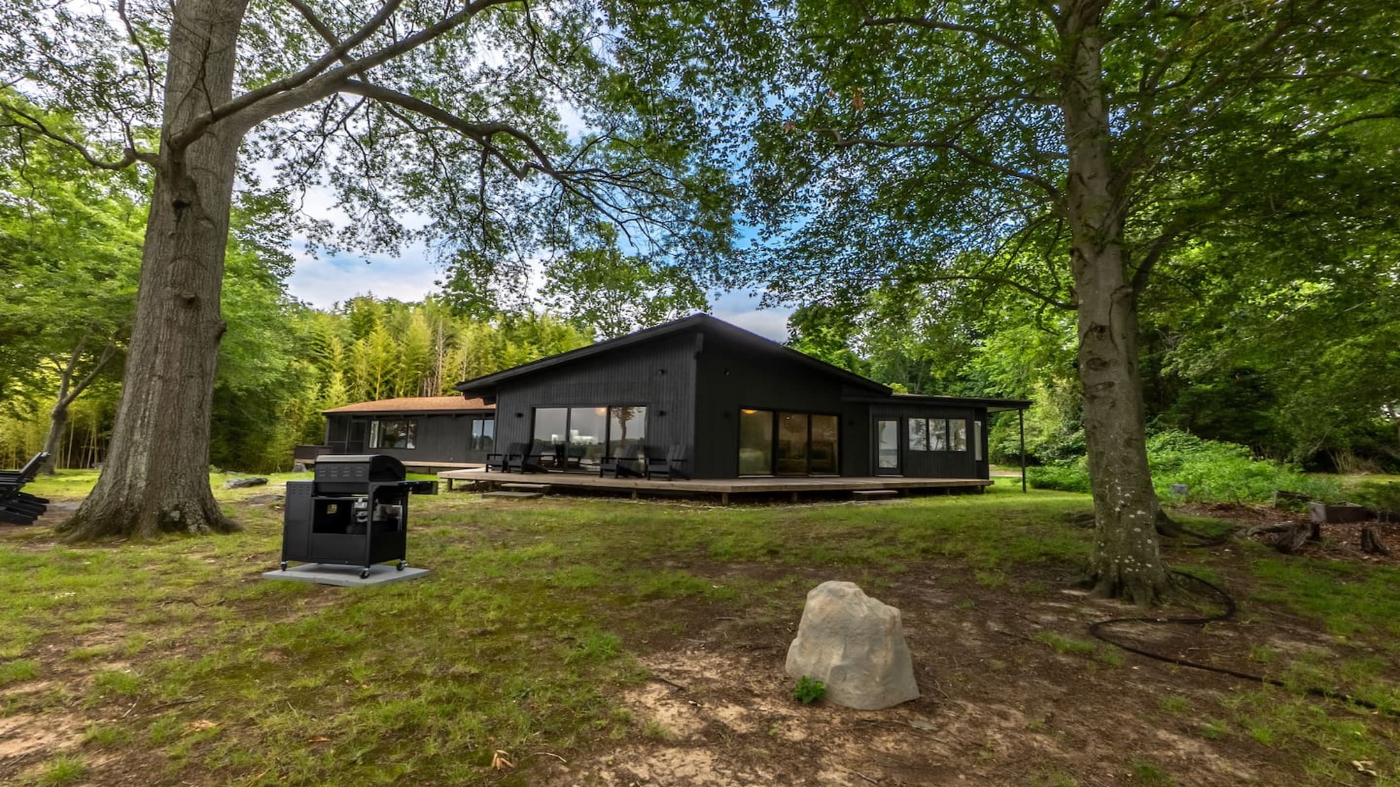 Riverfront Estate — Japanese-Zen Architecture, Black Modern Exterior, Private Grounds