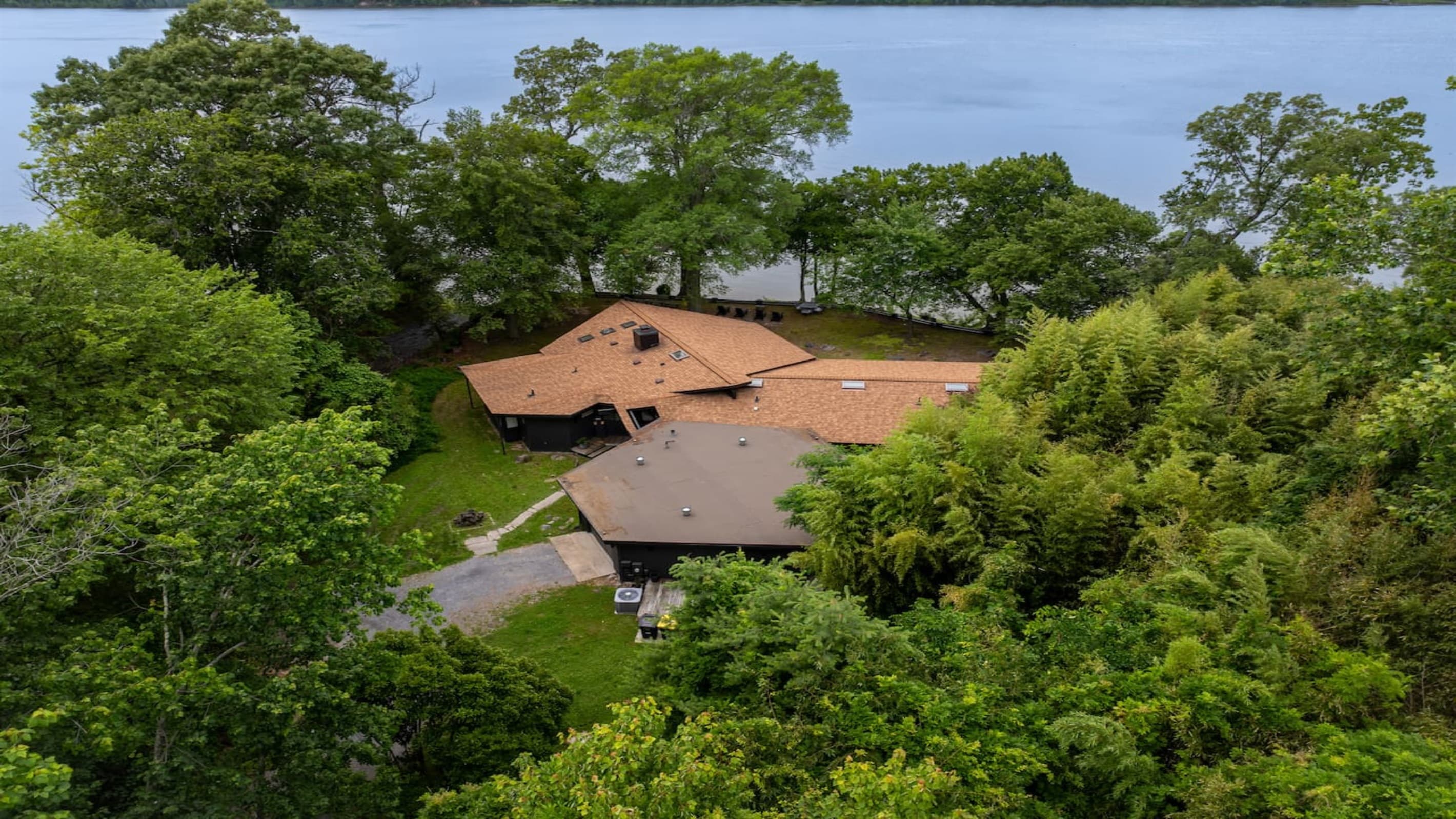 Fort Washington — Aerial Estate Grounds, Haiku River House, Lush Green Setting