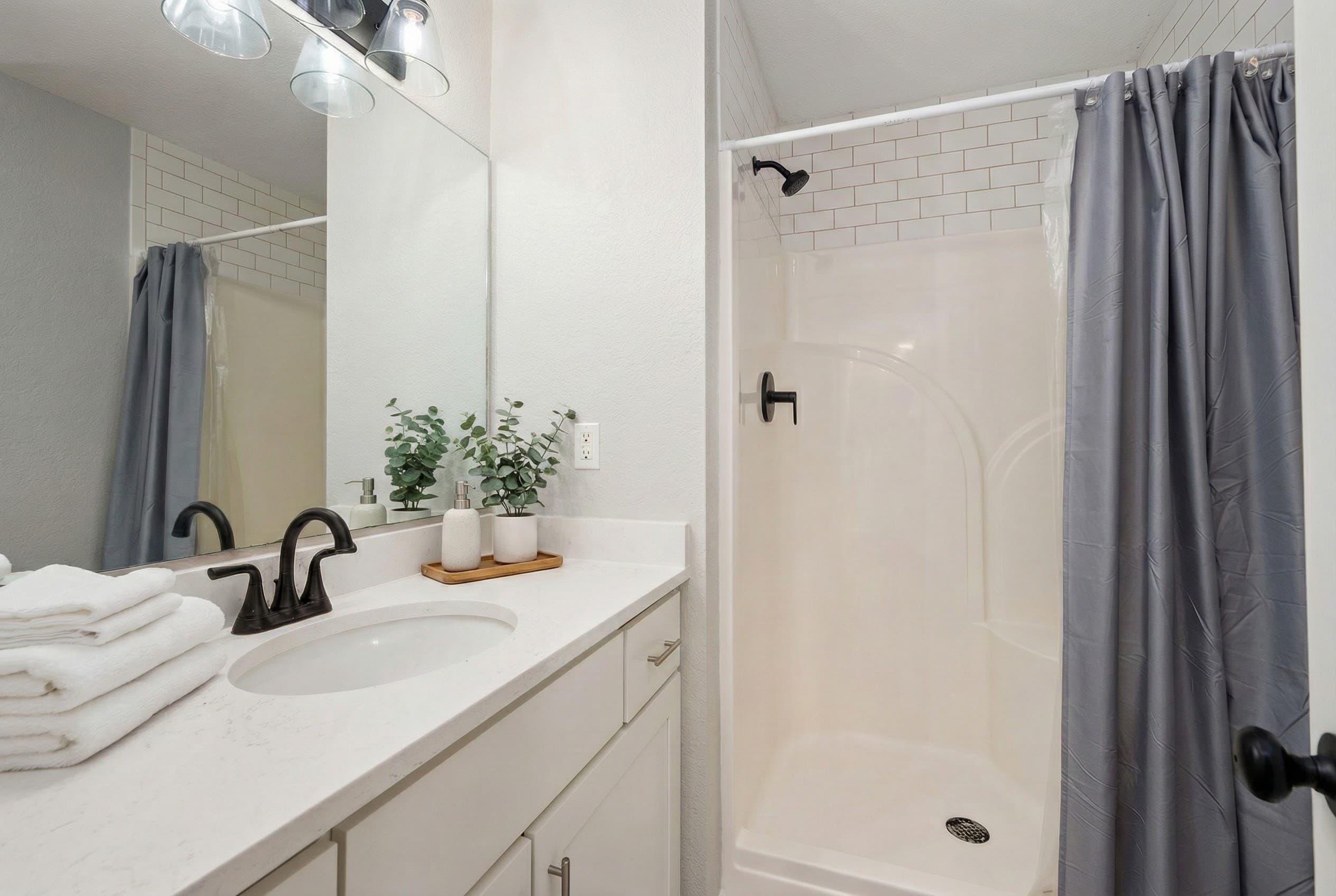 Ensuite Bath — Modern Walk-In Shower with Sleek Vanity | Harmankaya, Corolla Outer Banks