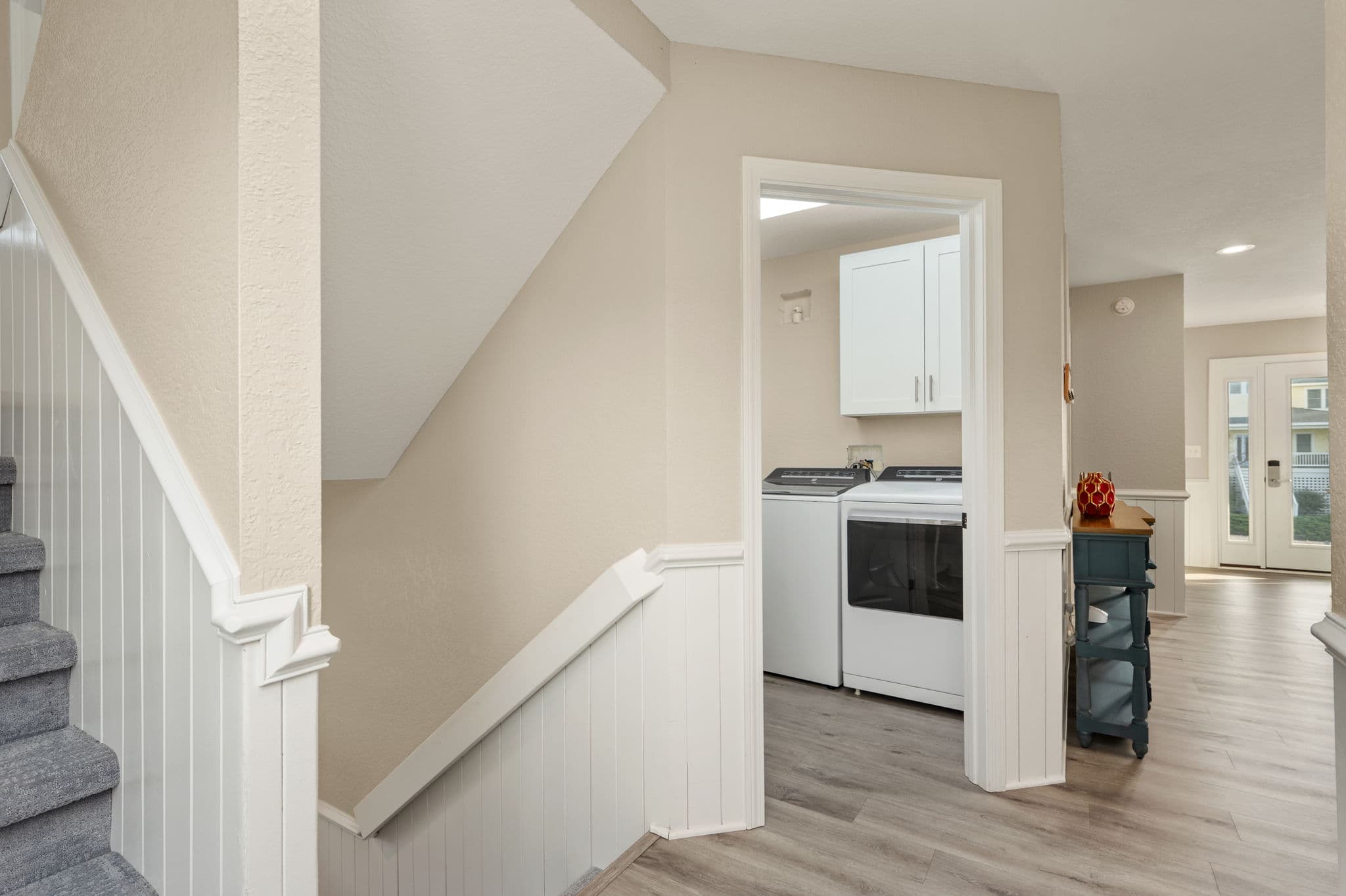 Bright & Inviting Hallway — Leading to Private Bedrooms Upstairs | Harmankaya, Corolla Outer Banks