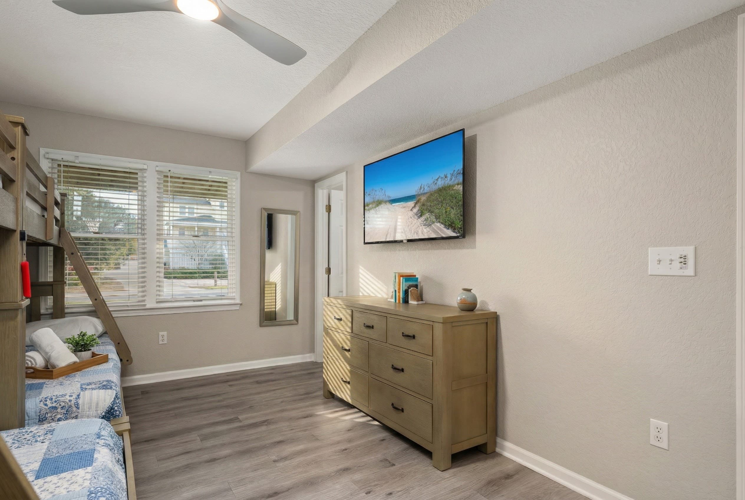 Cozy Ground-Level Bedroom with Large Smart TV — Warm Neutral Tones for Restful Sleep | Harmankaya, OBX