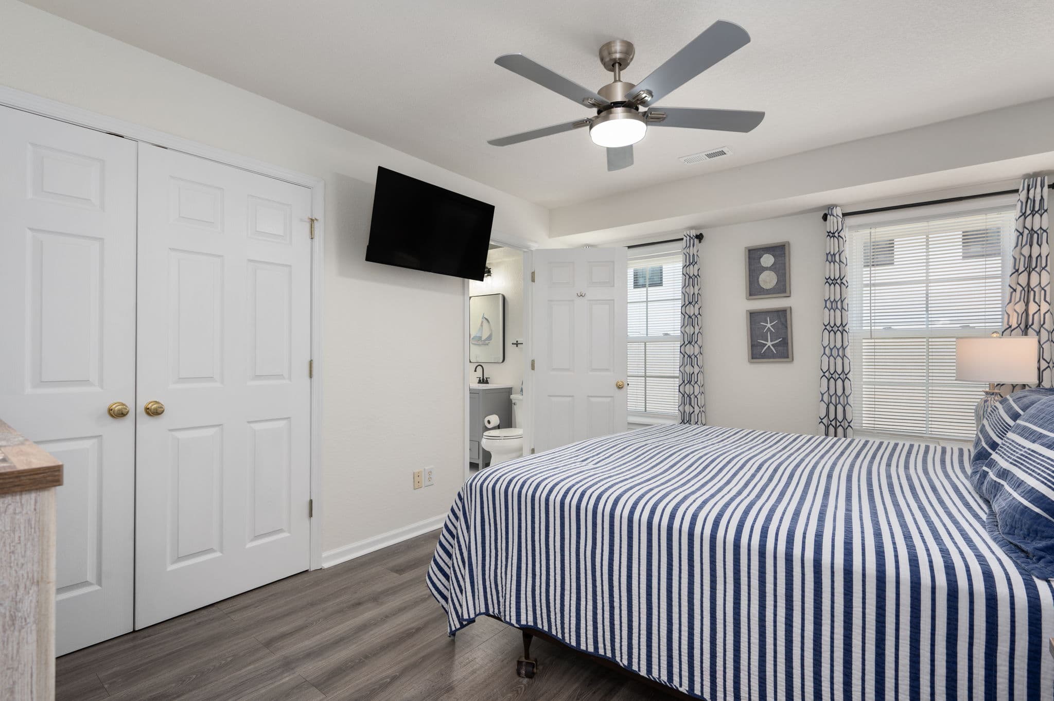 BR6 Charming Room with TV, Ceiling Fan & Ocean-Inspired Décor | Coastline Haven, Outer Banks