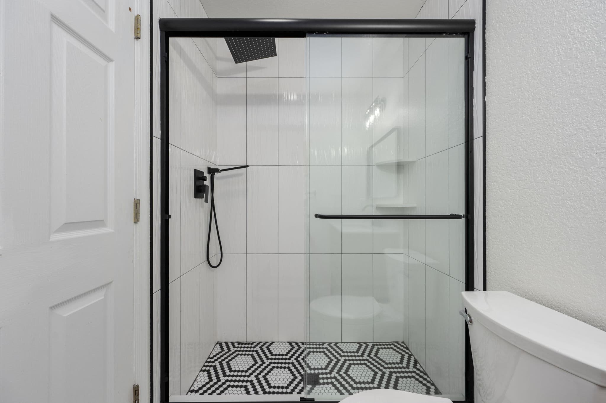 BR2 Ensuite — Walk-In Shower with Glass Doors & Contemporary Fixtures | Coastline Haven, OBX