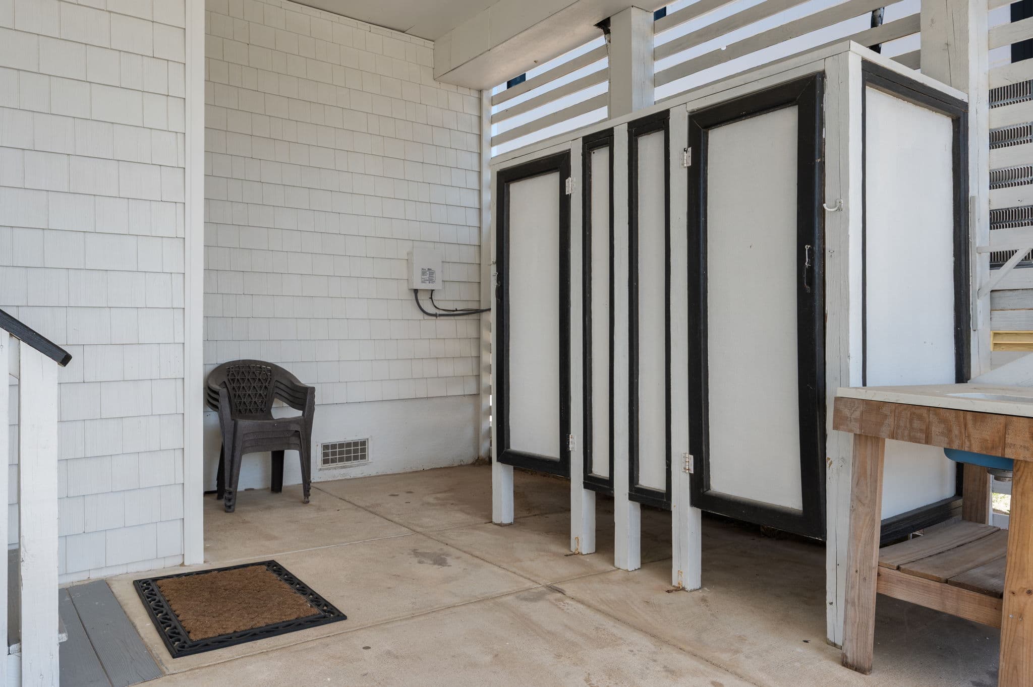 Outdoor Shower & Changing Area — Rinse Off After a Day at the Beach | Coastline Haven, Outer Banks