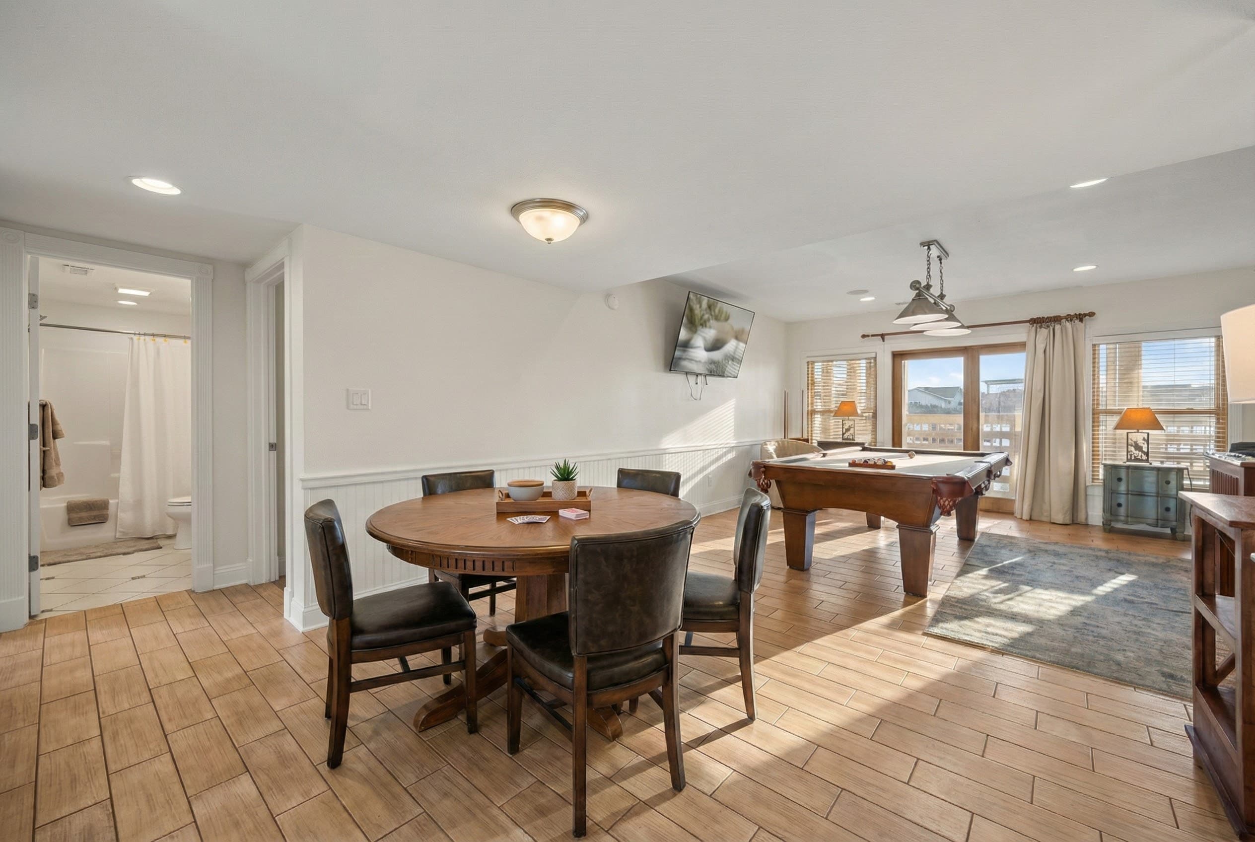 Game Room Lounge Area — Comfortable Seating for Game Night | Angler's Retreat Oceanfront Estate, OBX