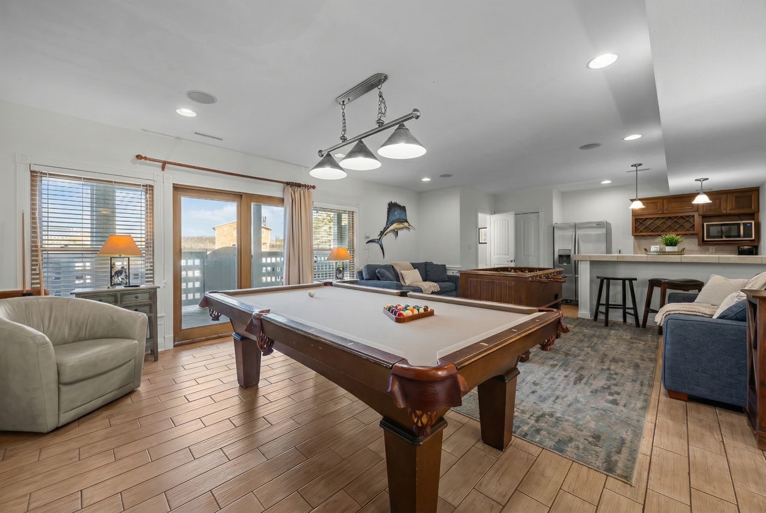 Game Room & Kitchenette — Pool Table, Lounge Seating & Bar Area on Ground Level | Angler's Retreat, OBX