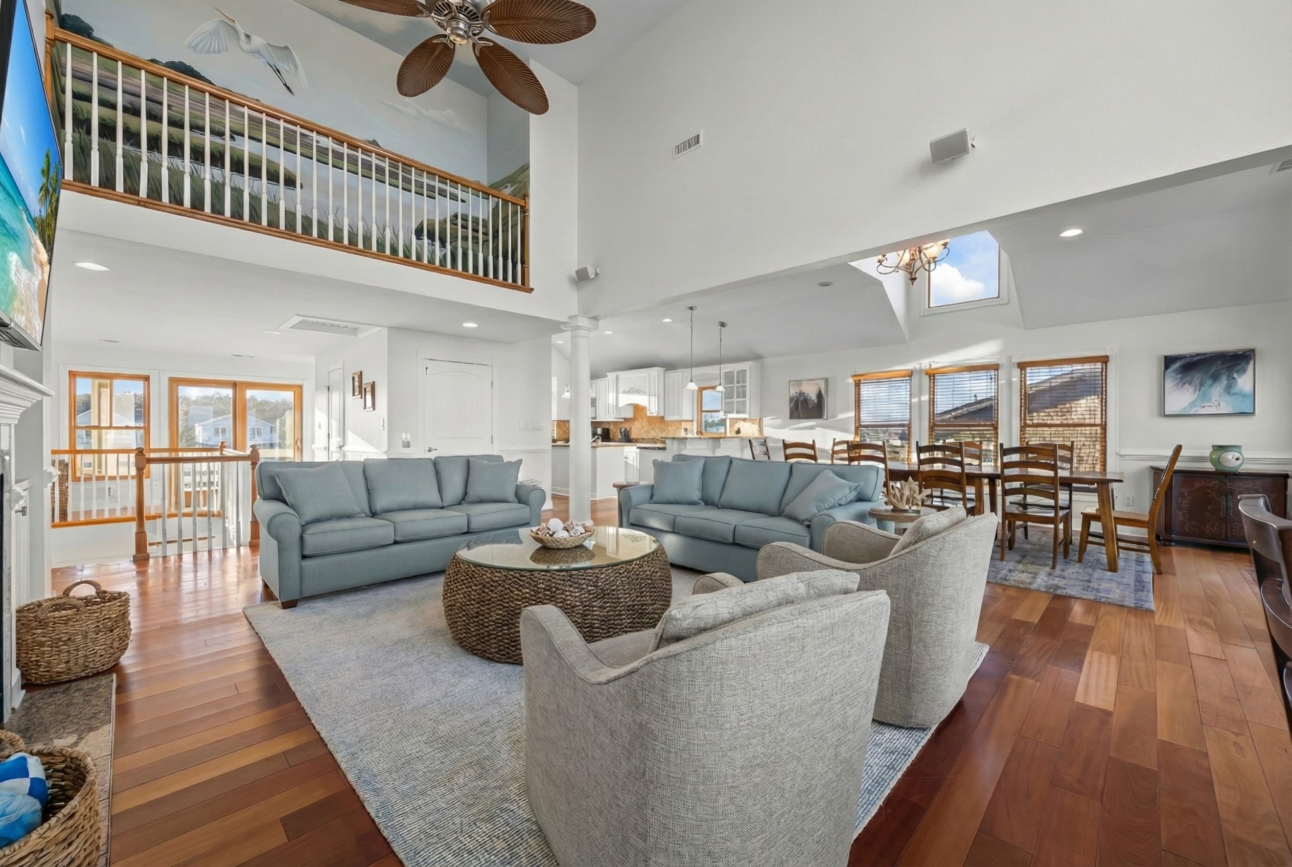 Dramatic Loft View of the Open-Concept Living Area — Soaring Ceilings & Natural Light | Angler's Retreat, Outer Banks
