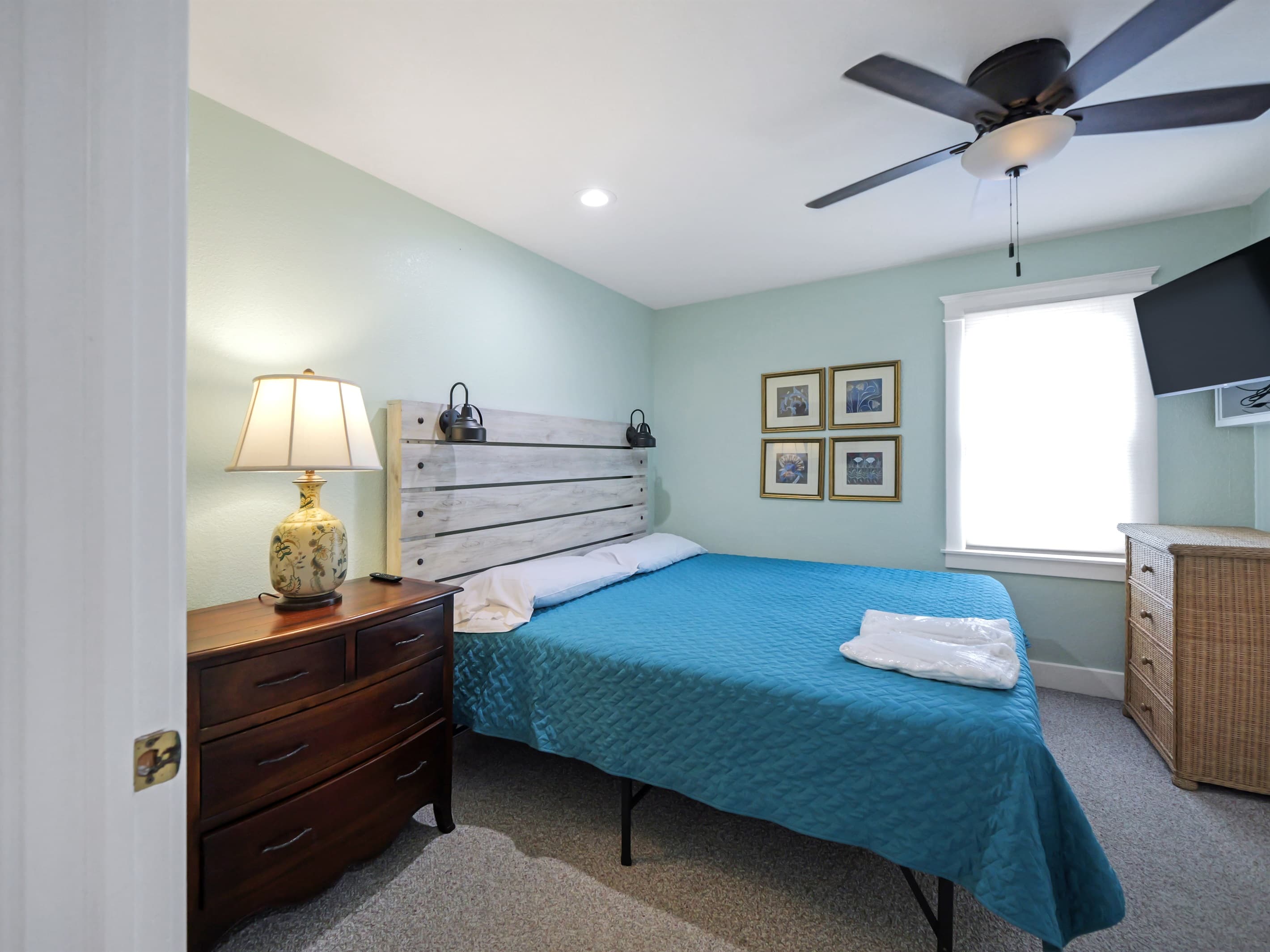 Bedroom 6 at The Fitzgerald — Warm & Inviting Design with Comfortable Bedding | 28BR Oceanfront Estate, Outer Banks