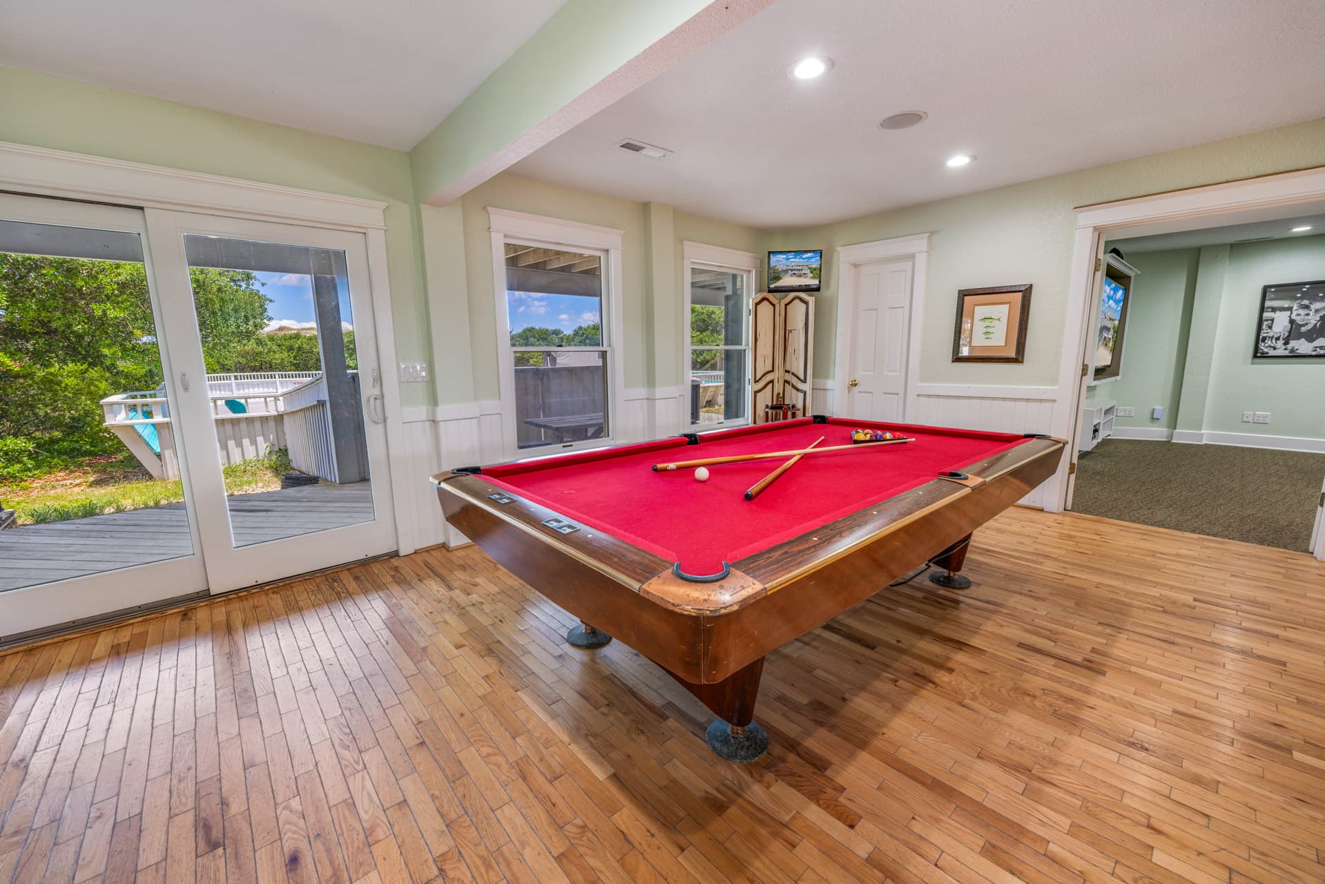 The Fitzgerald Game Room with Pool Table — Entertainment for All Ages | 28BR Oceanfront Estate, Corolla, Outer Banks