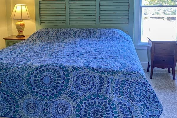 King Bedroom at The Fitzgerald — Relaxing Retreat After a Beach Day | Part of 28BR Estate, Outer Banks