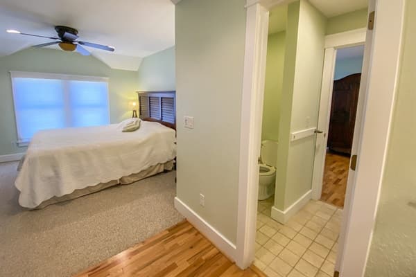 Inviting Bedroom at The Fitzgerald — Plush Bedding & Coastal Design | Fitzgerald & Hemingway Estate, Outer Banks