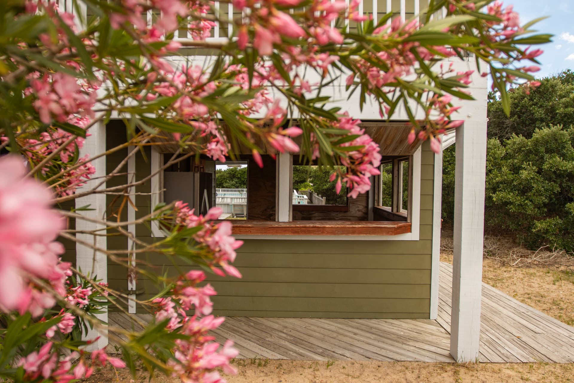 The Fitzgerald Exterior at Dusk — Grand Oceanfront Architecture on 6 Private Acres | Corolla 4x4 Beach, Outer Banks